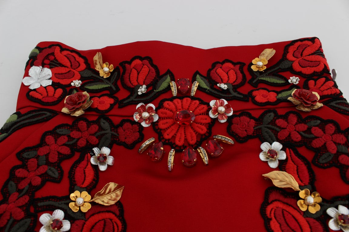 Red embroidered garment with floral patterns
