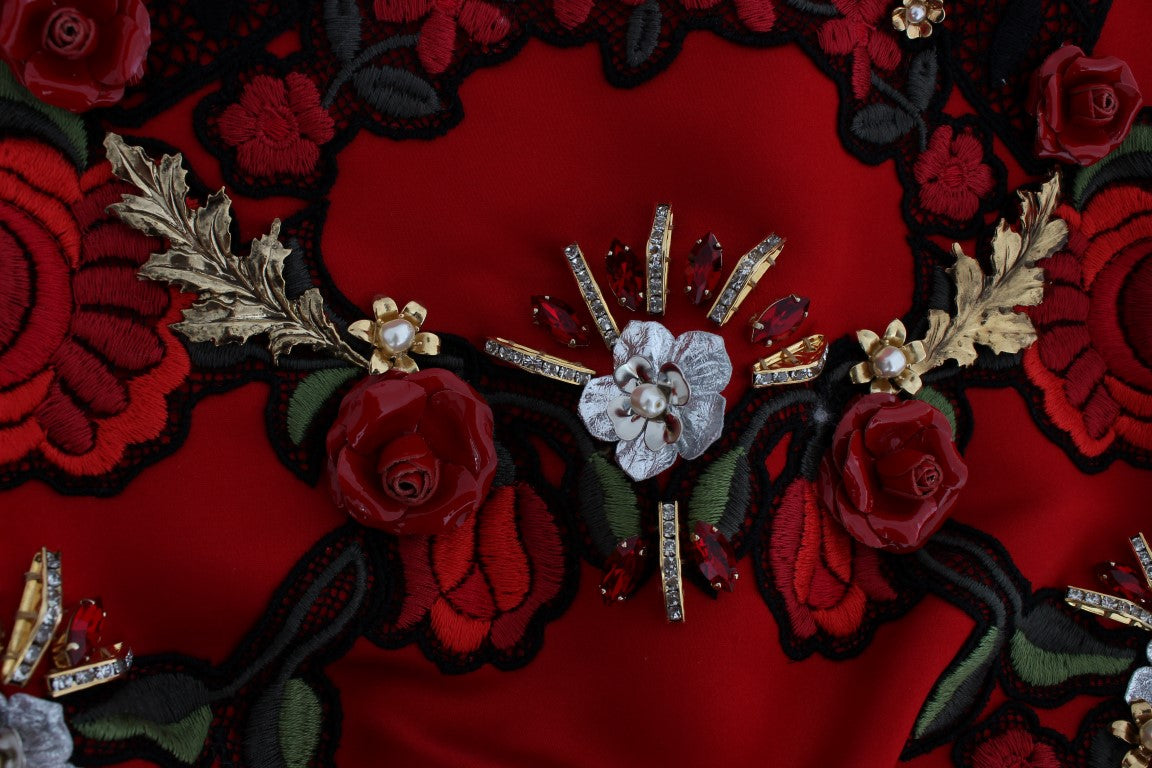 Red embroidered garment with floral pattern and gold accents