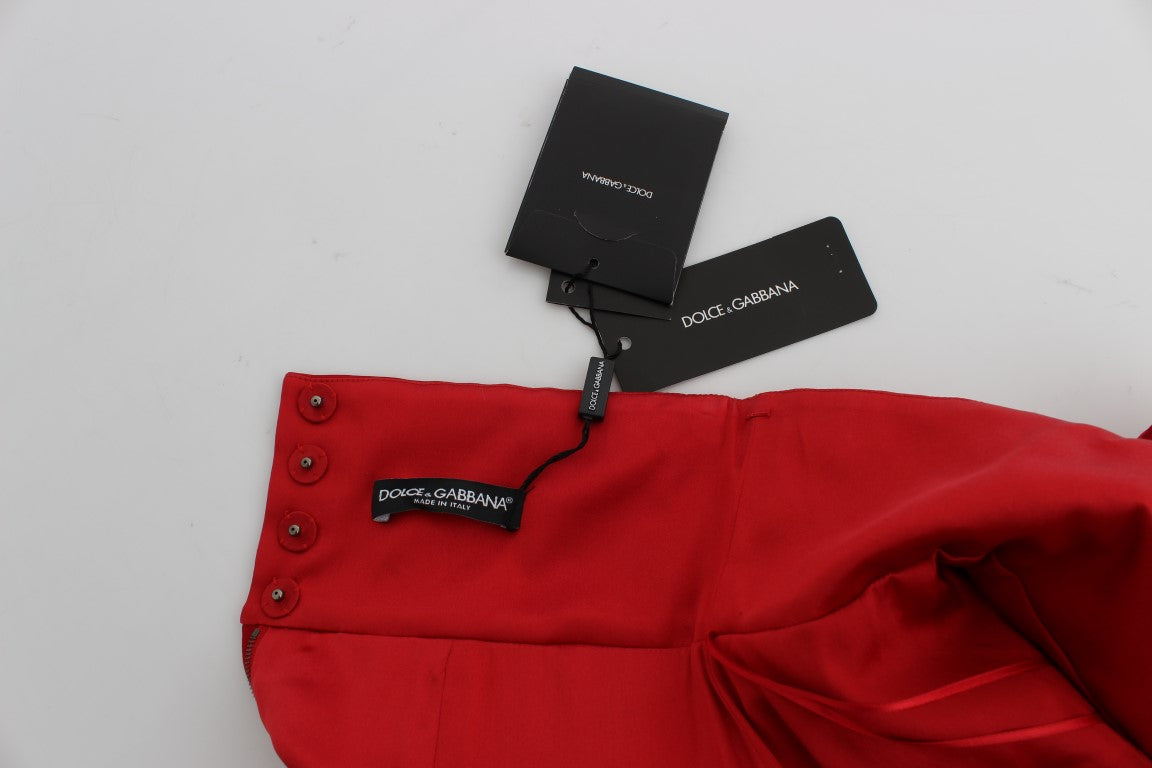 Red pants on a hanger with tags