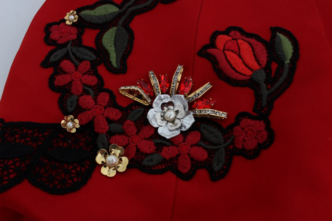 Red embroidered hat with floral pattern and gold accents