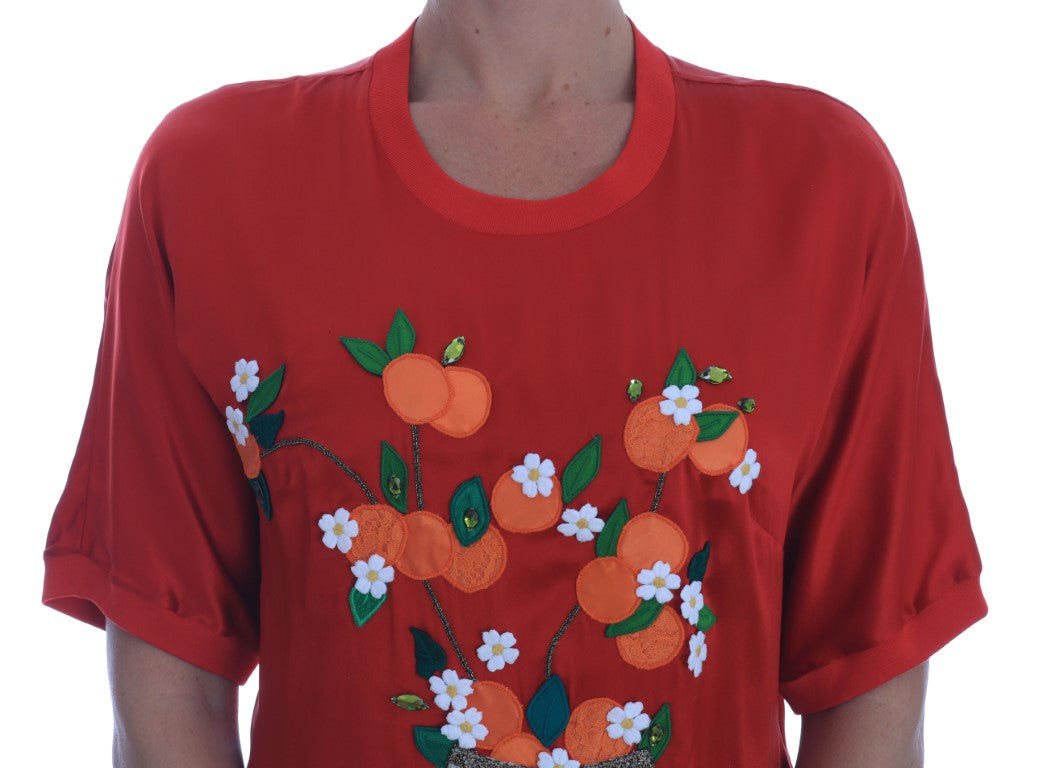 Red shirt with orange flowers embroidered on front