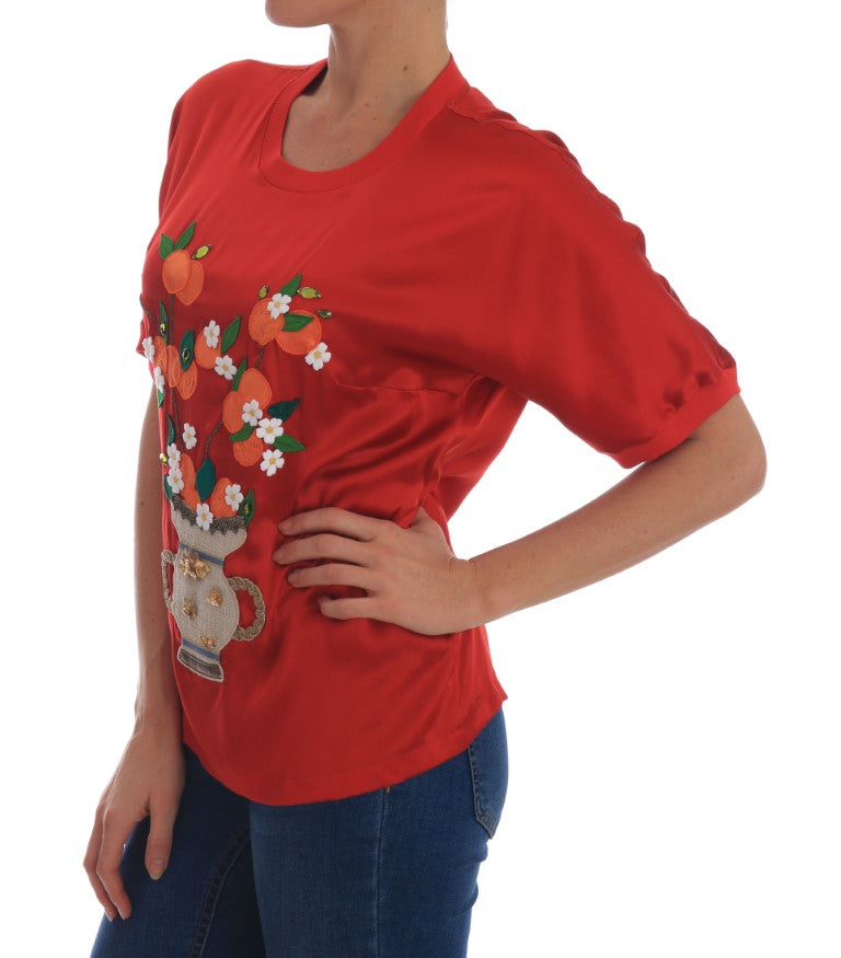 Red shirt with floral design on front