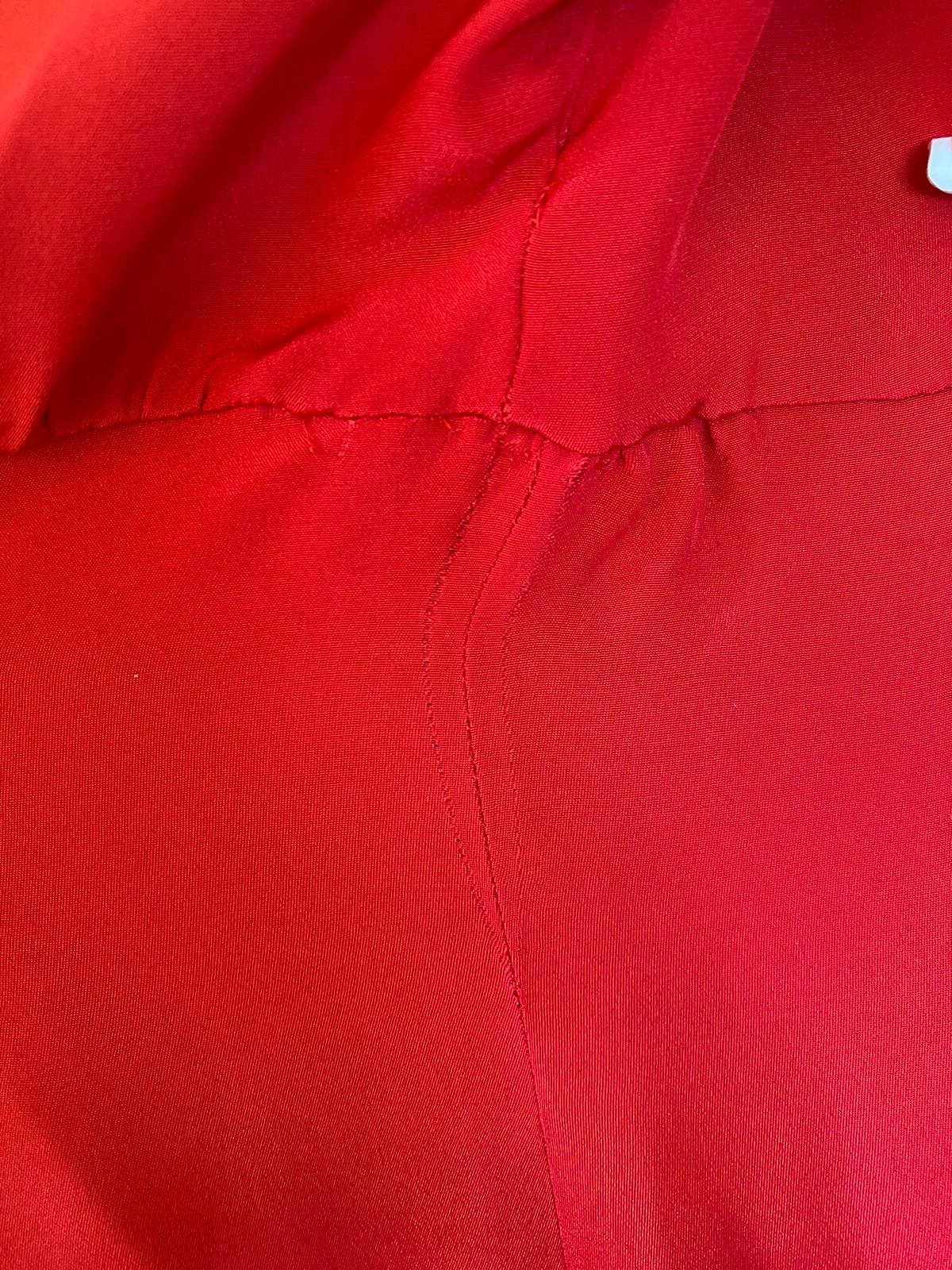 Red silk sheath dress with A-line cut and knee length