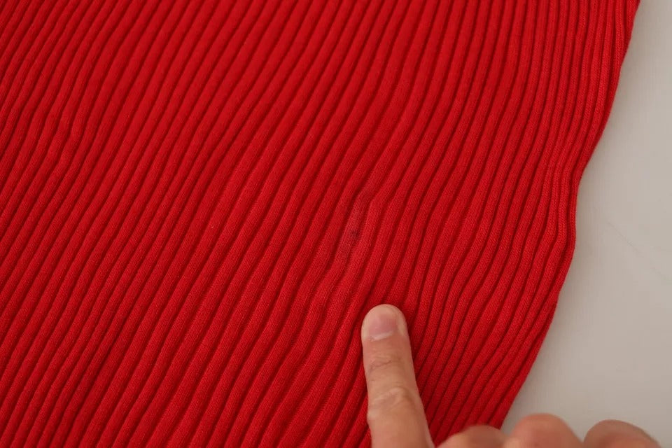 Red fabric with a hole in it