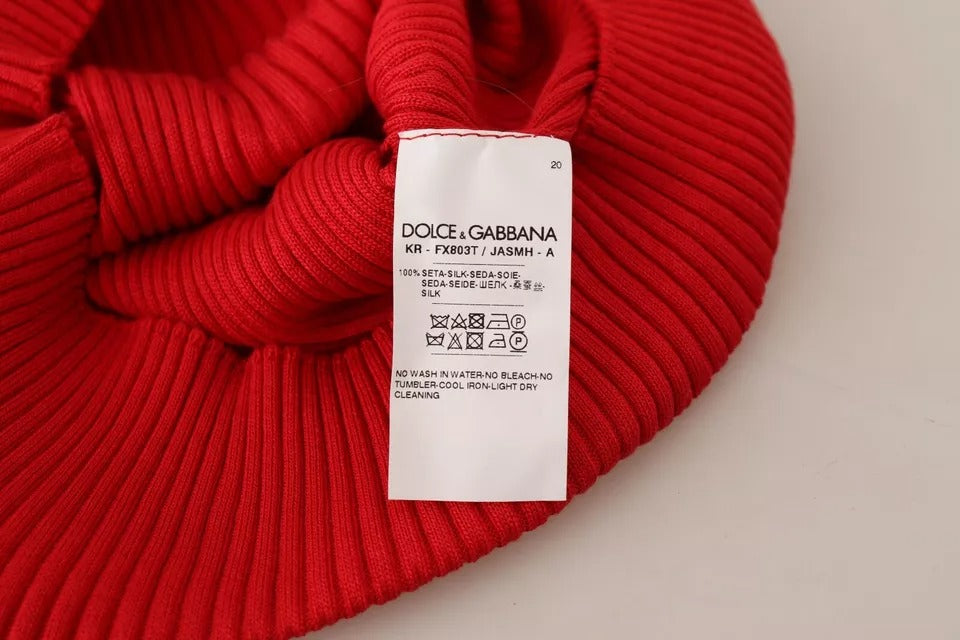 Red knitted hat with white tag