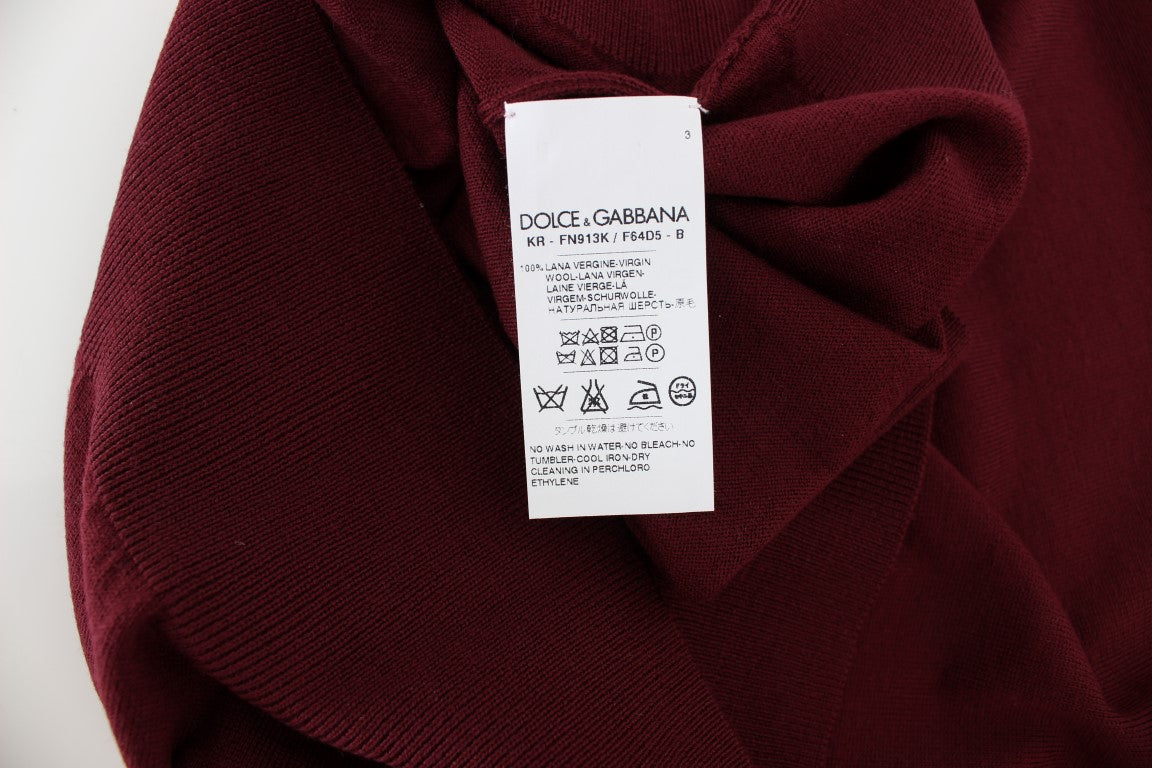 Burgundy fabric with a tag on it
