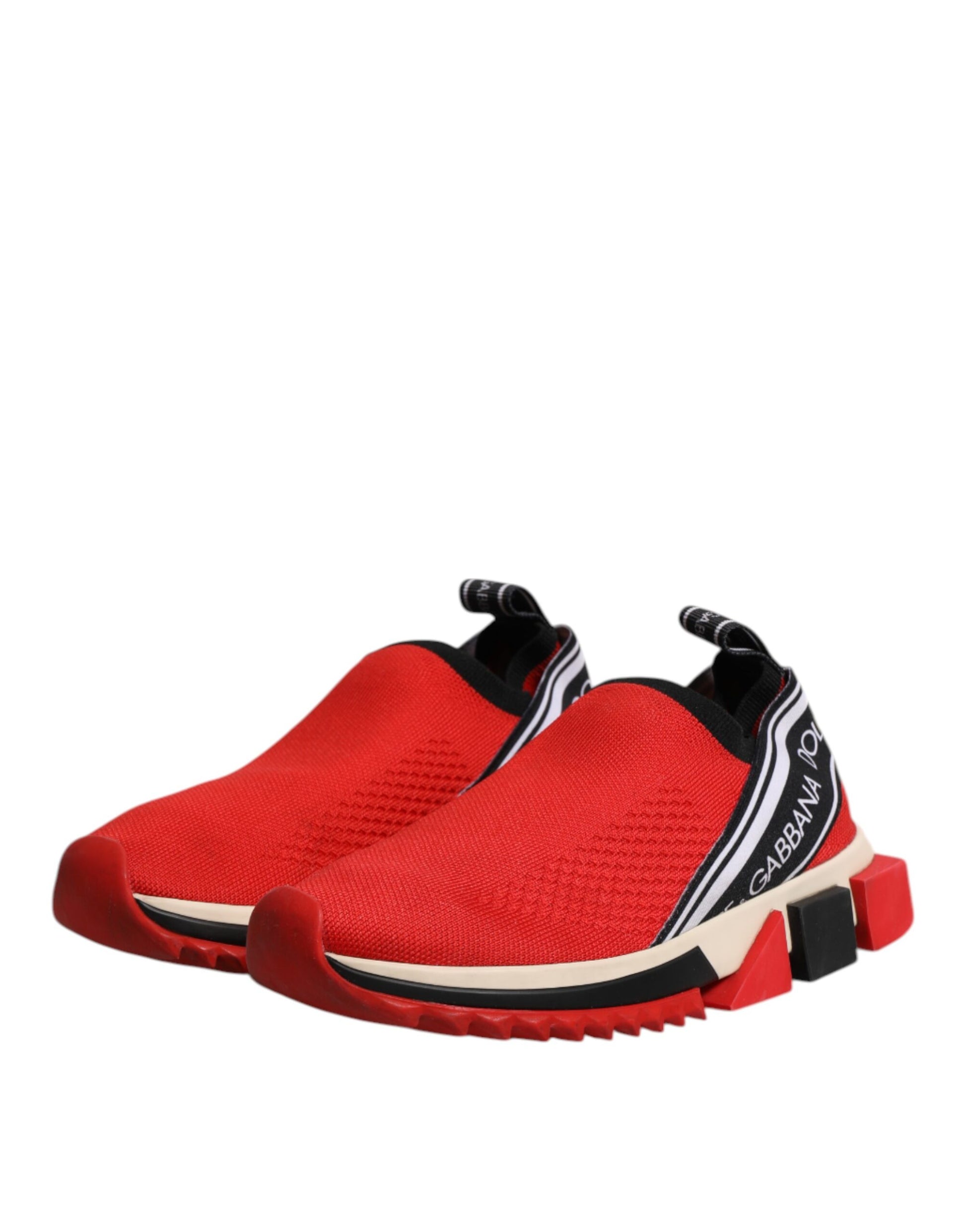 Red slip-on shoes with white laces and black logo on side