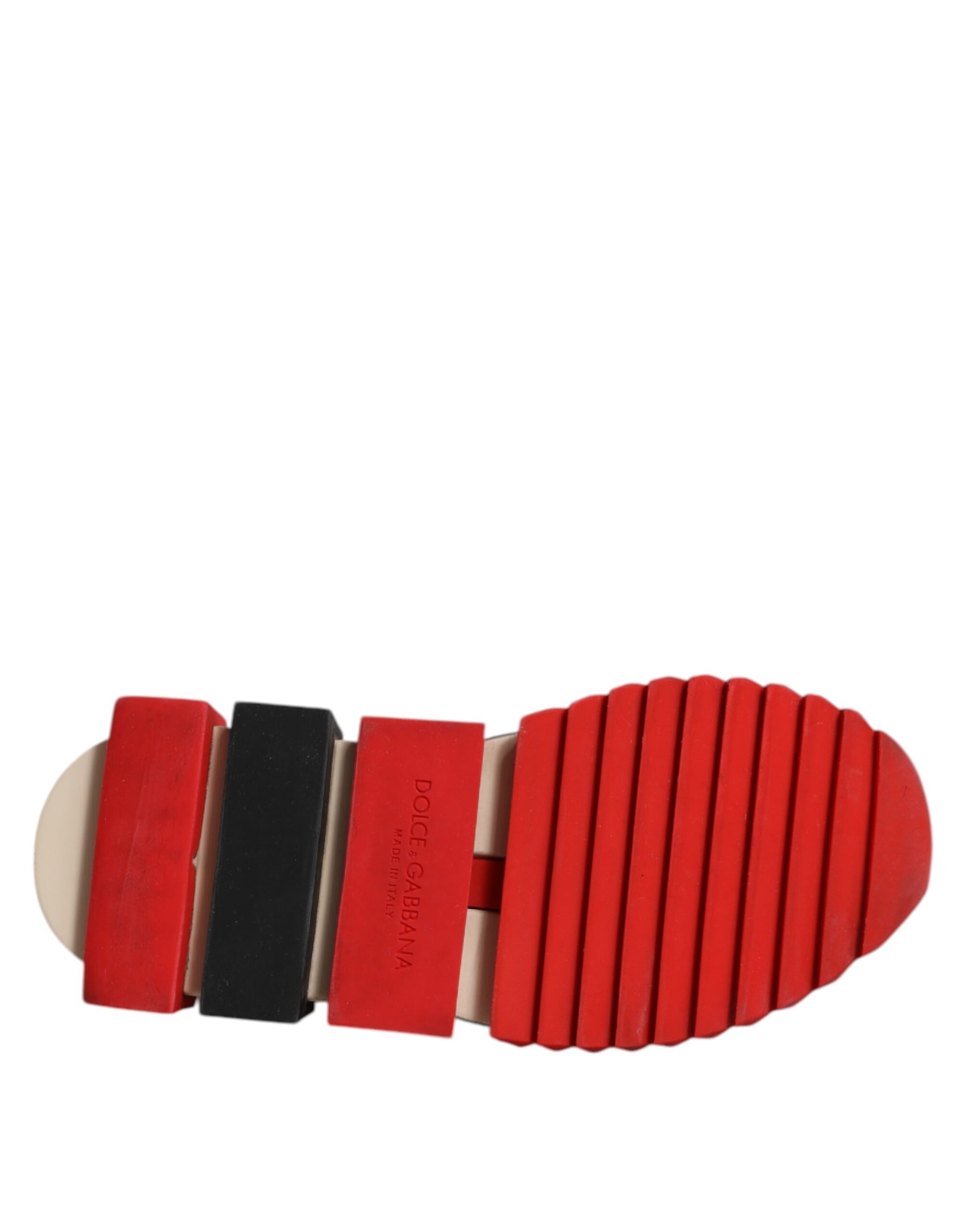 Red slip-on shoes with black and white accents, featuring a textured sole