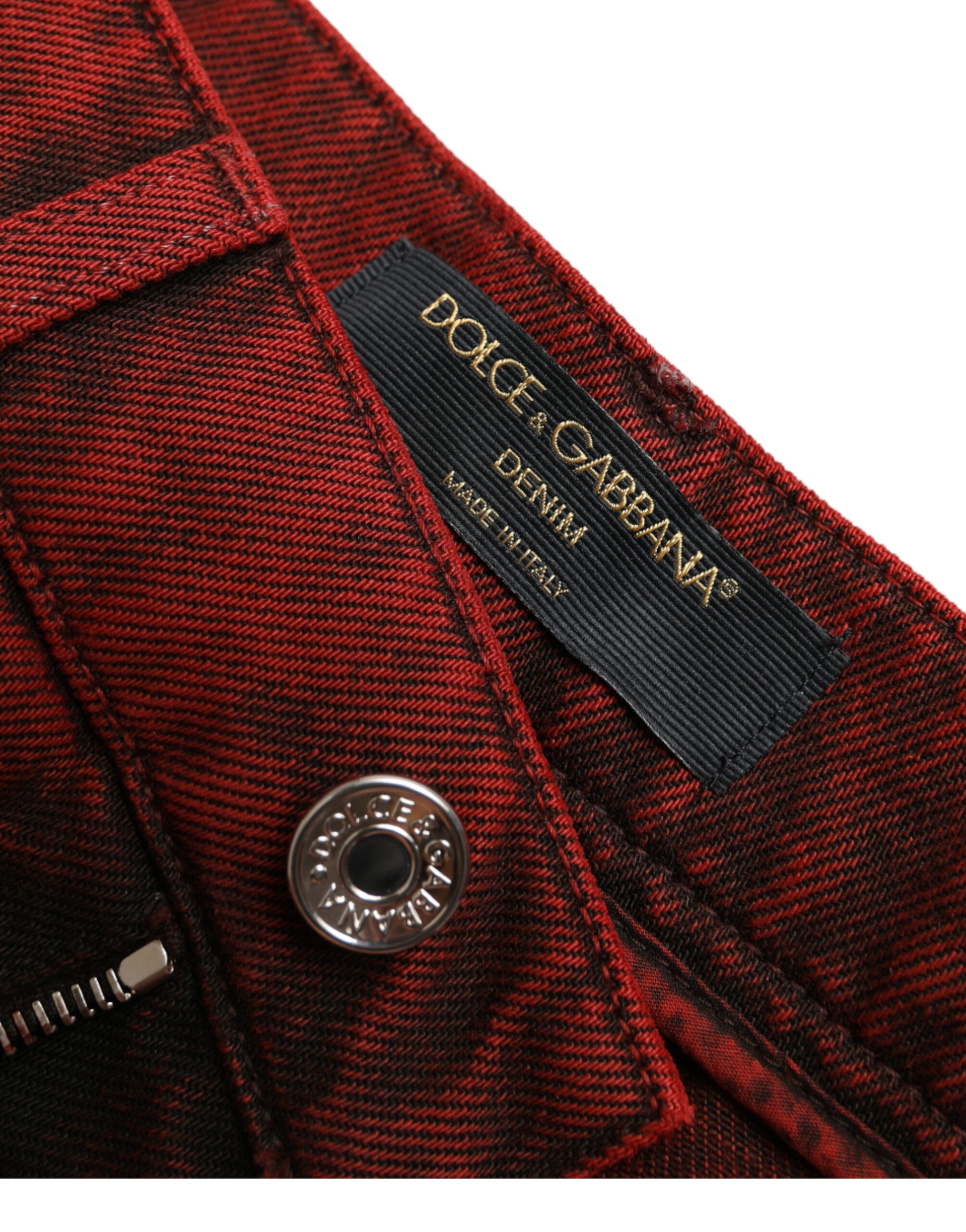 Red jeans with black label on waistband