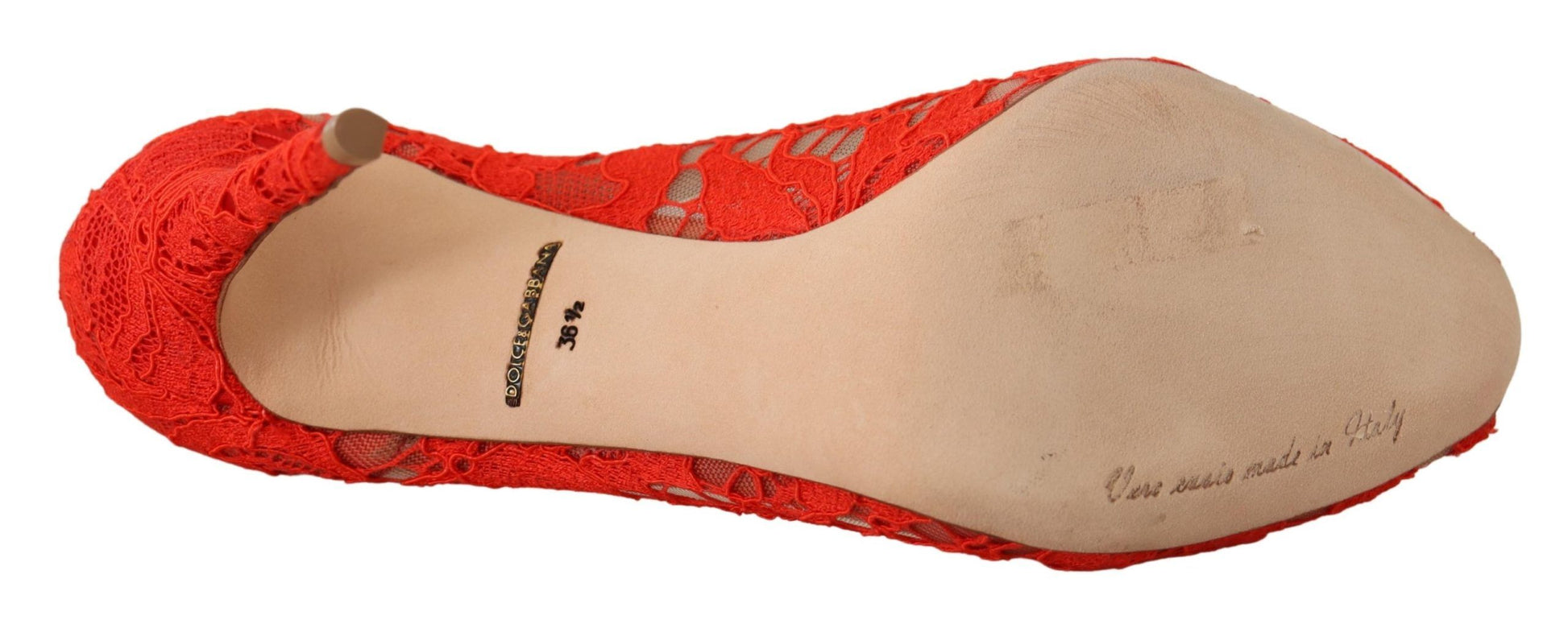 Red high heel shoe with black writing on side