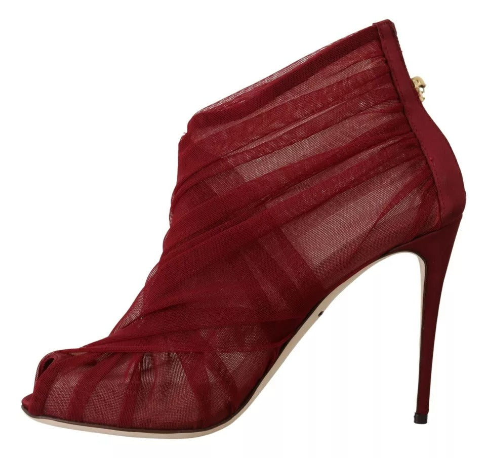 Red high heel boot with lace detailing