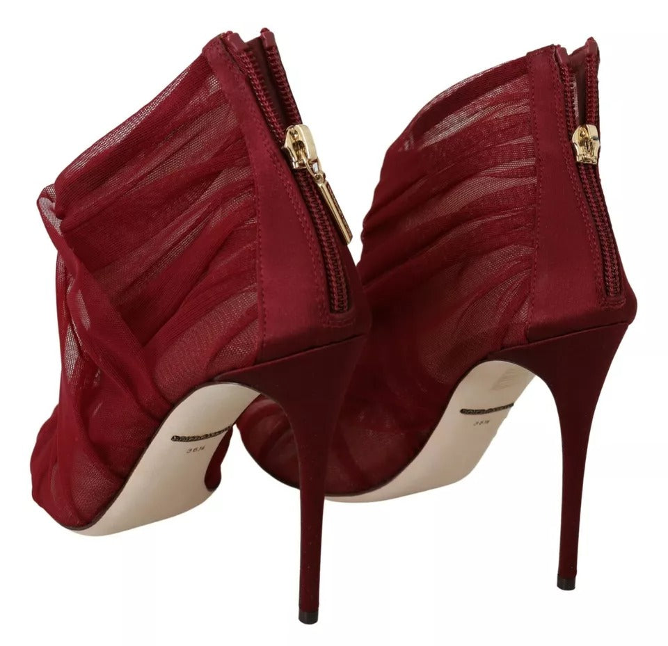 Red high heel shoes with a zipper on the side