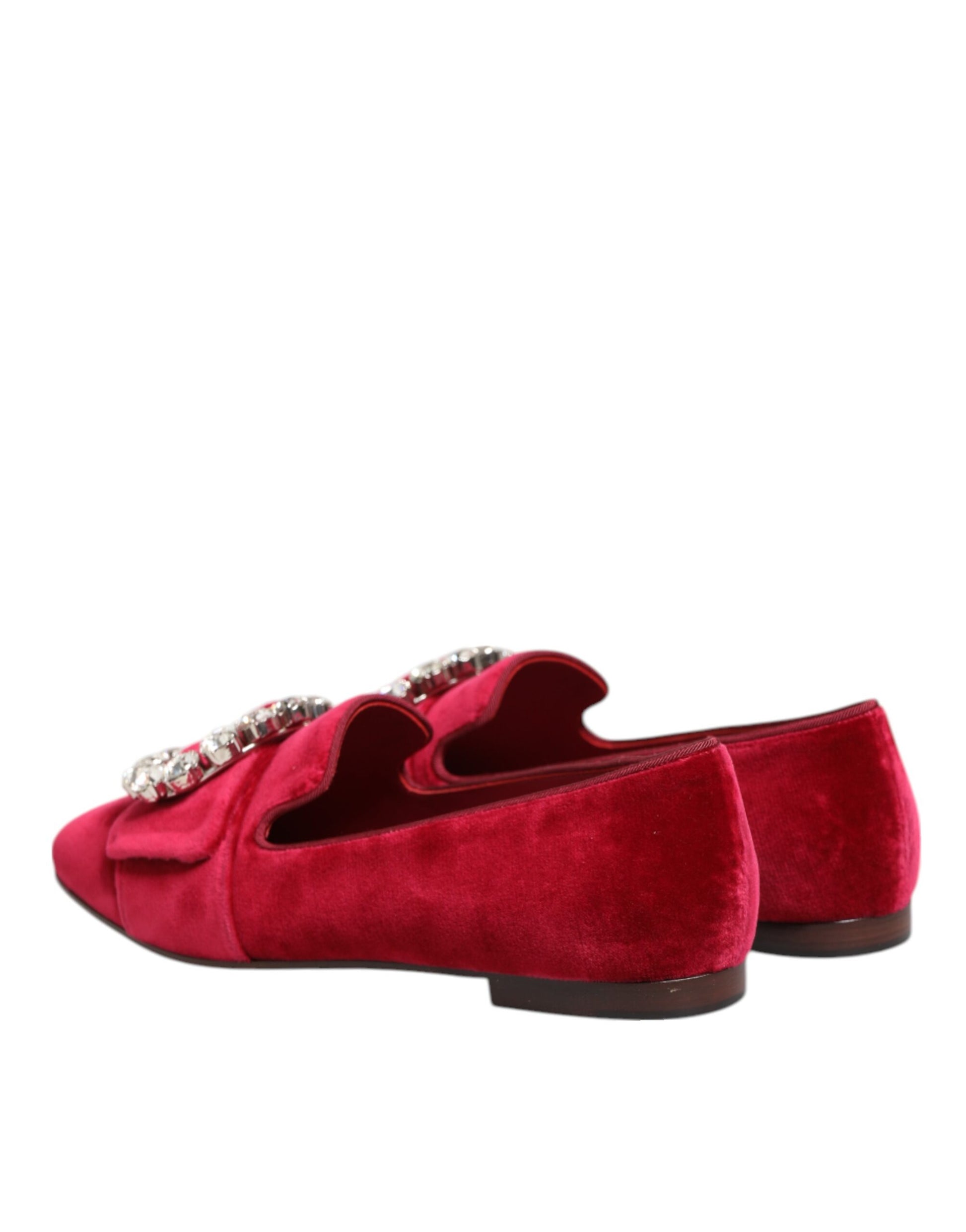 Red velvet shoes with embellishments on top