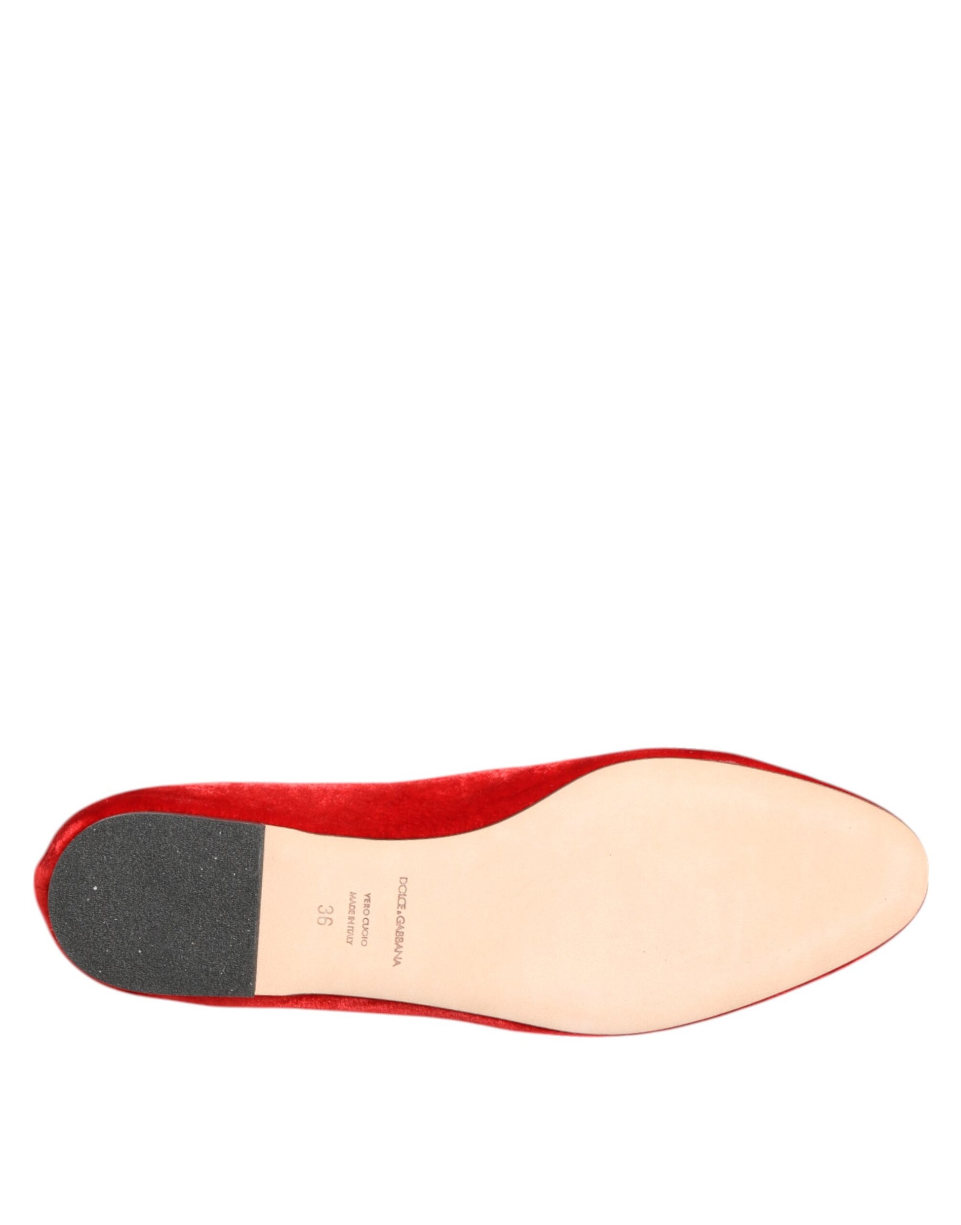 Red high heel shoe with black sole