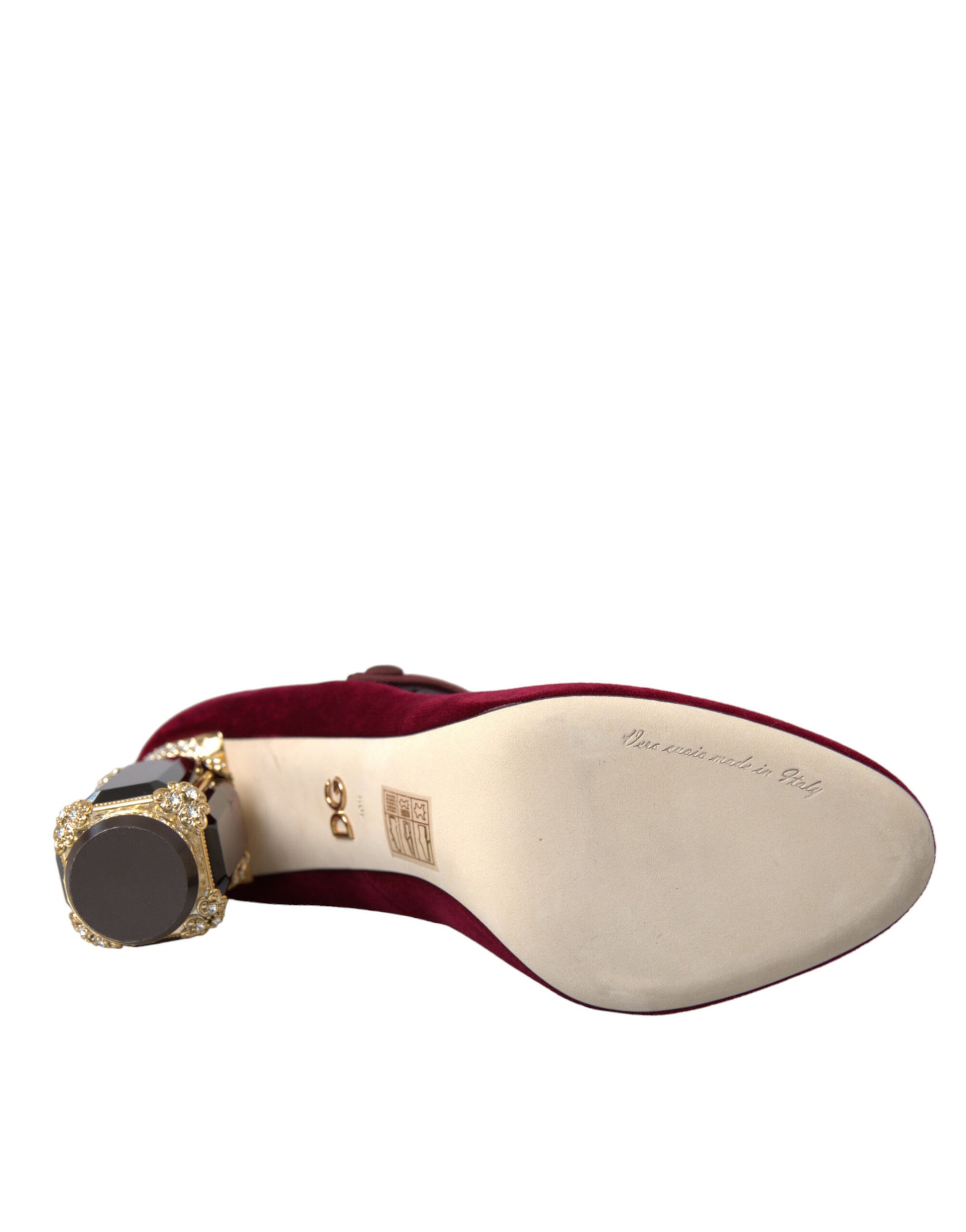 Tan shoe with red interior and gold accents