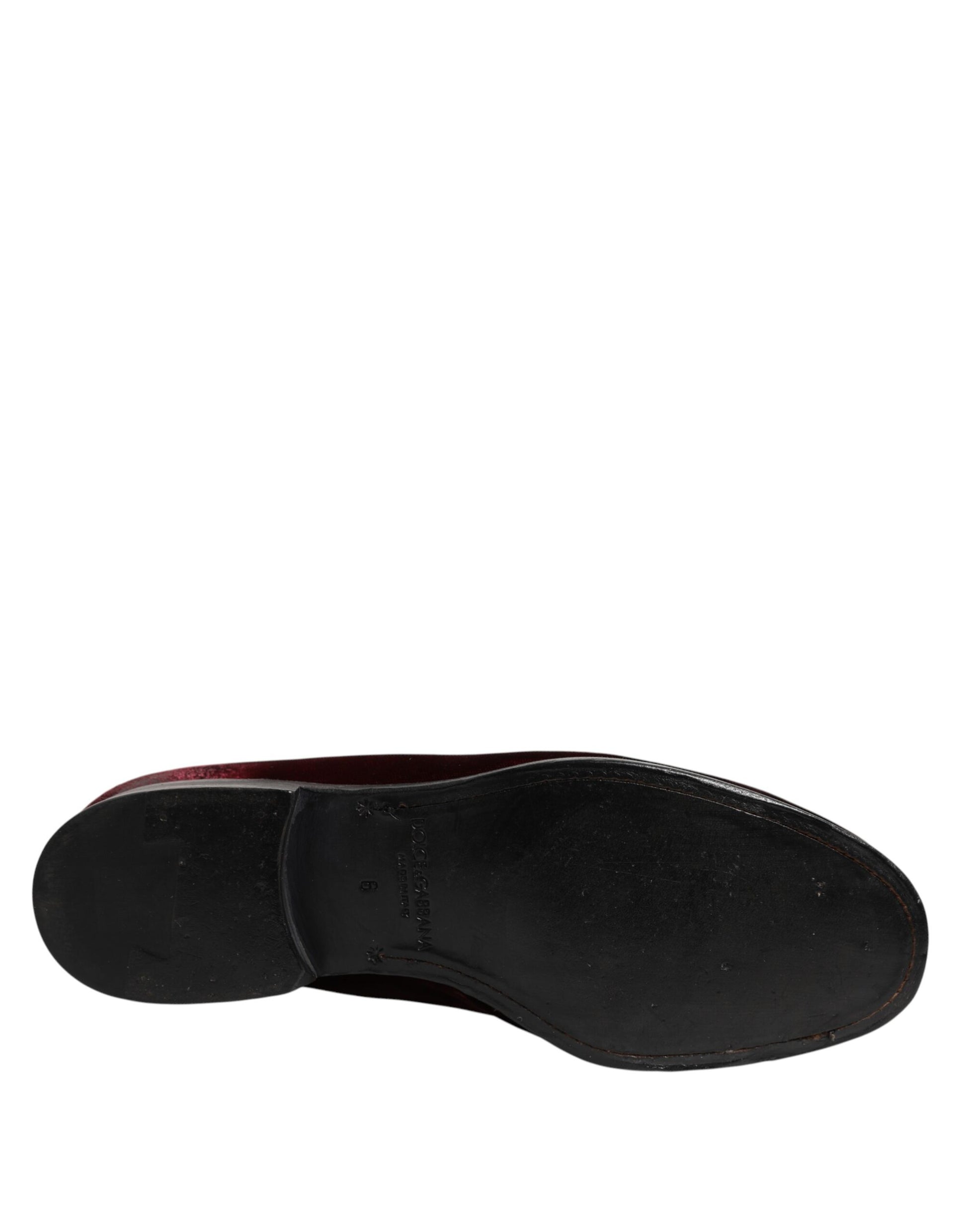 Black velvet men's loafer with red accents, featuring a slip-on design and elastic panels for comfort