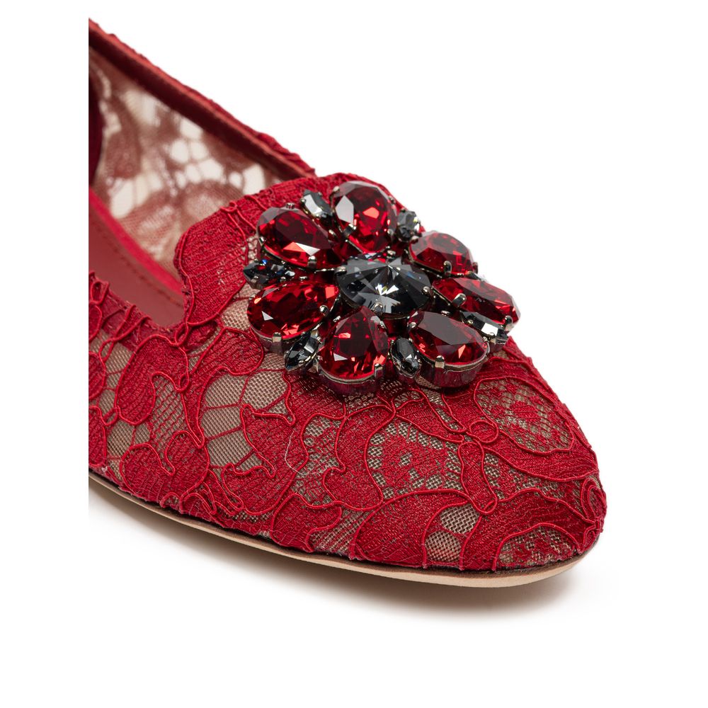 Red shoe with lace design and rhinestone brooch