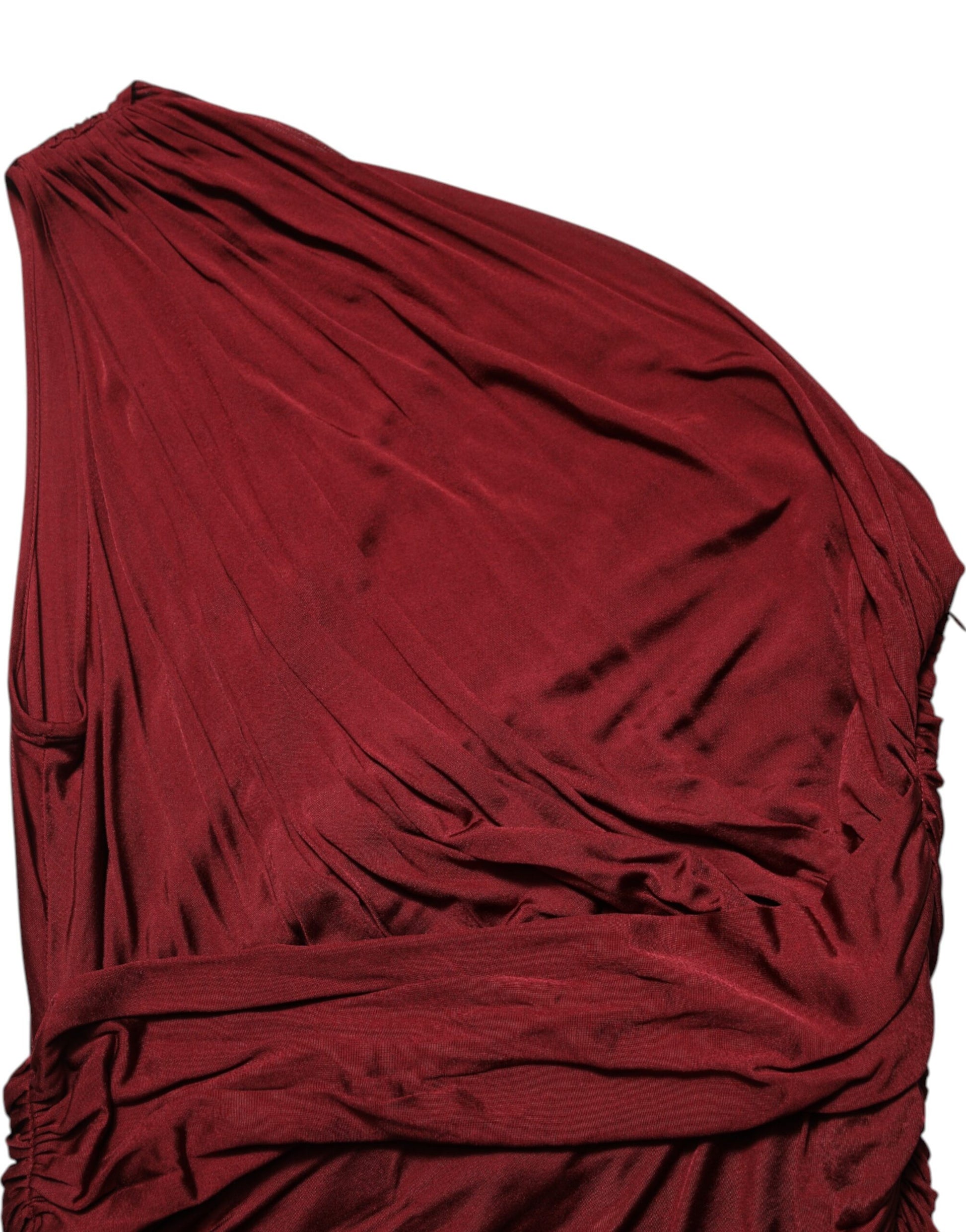 Red fabric draped over a surface