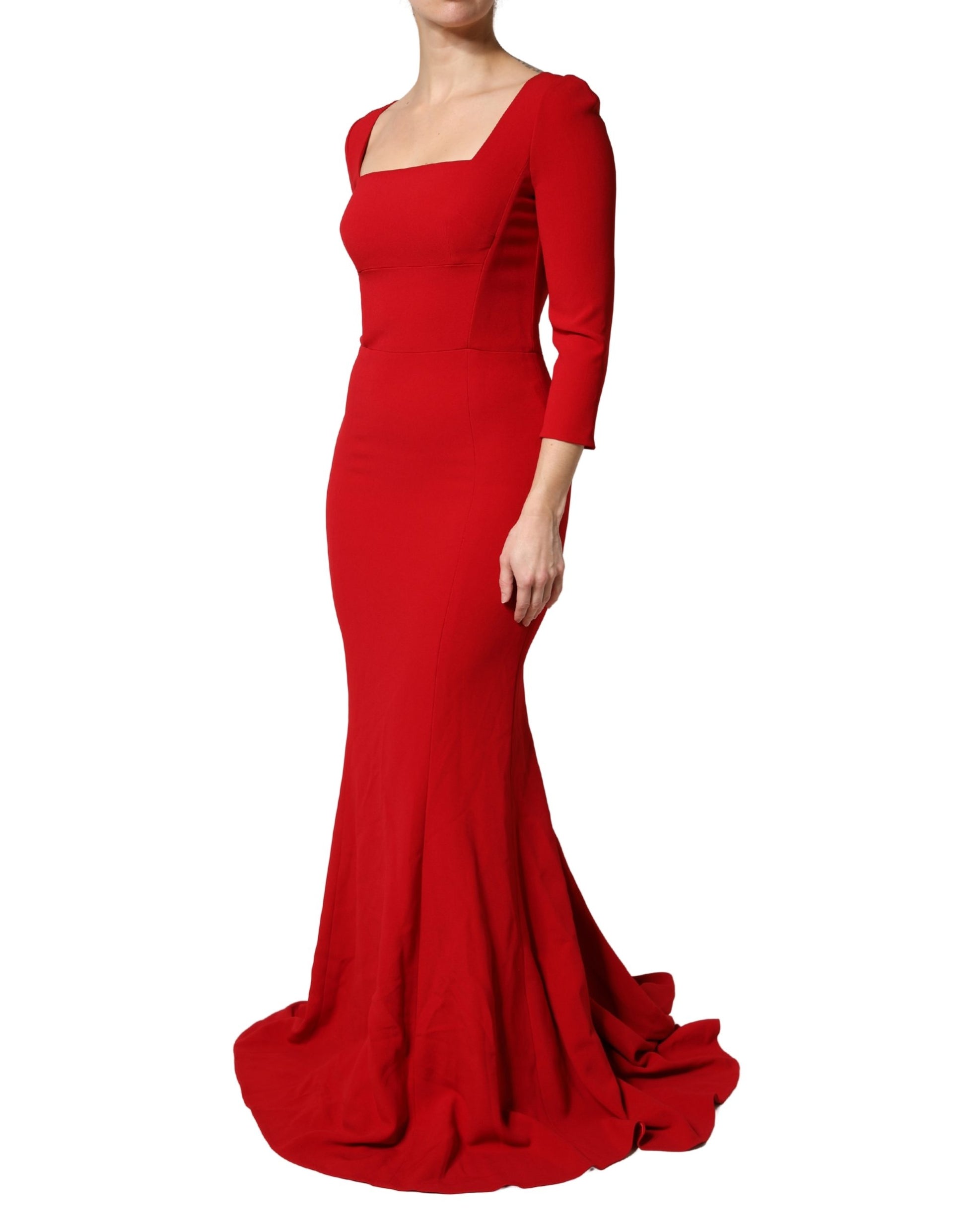 A red mermaid dress with long sleeves and a body-skimming silhouette