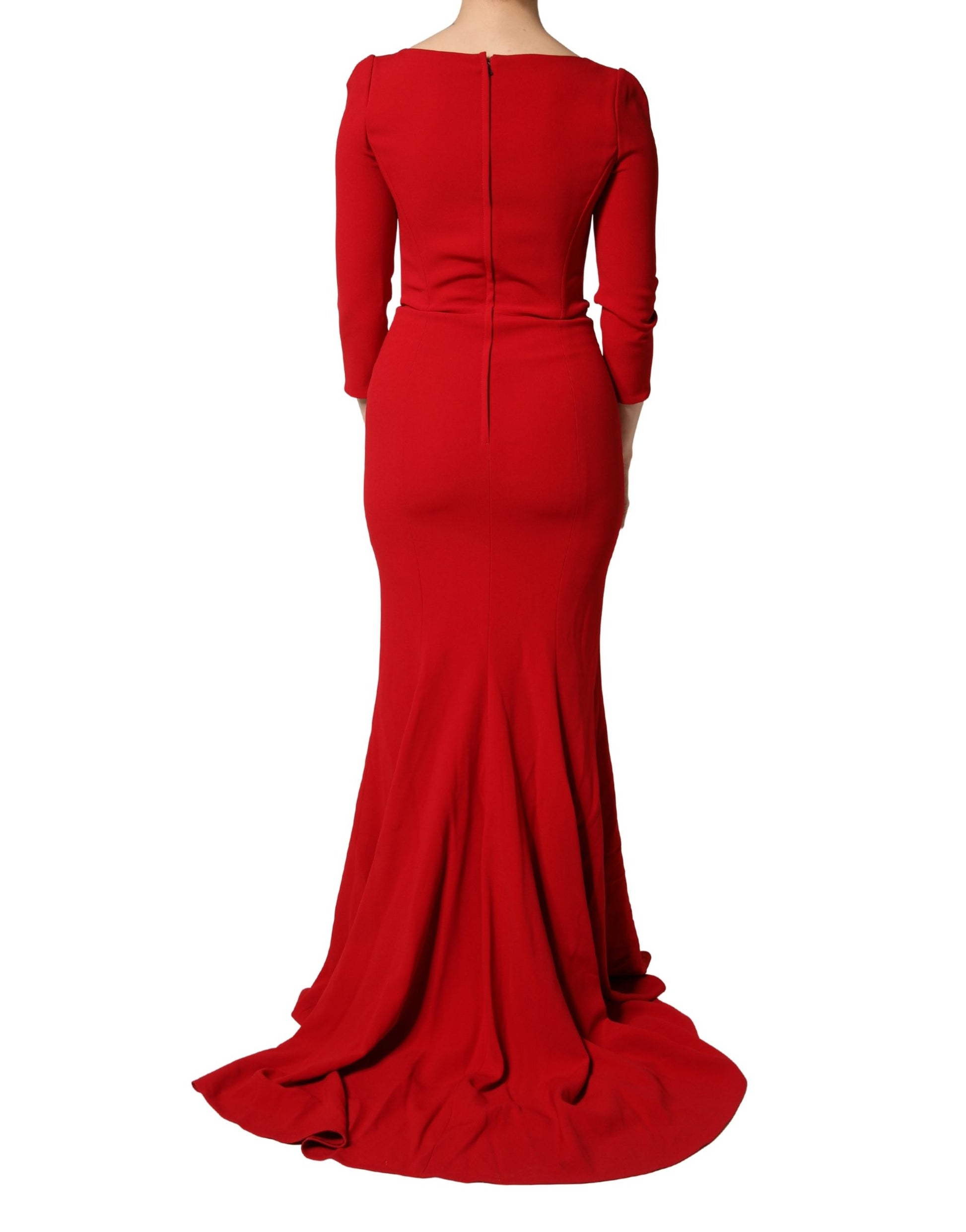 A red mermaid dress with a sheer viscose fabric and ruffled hem