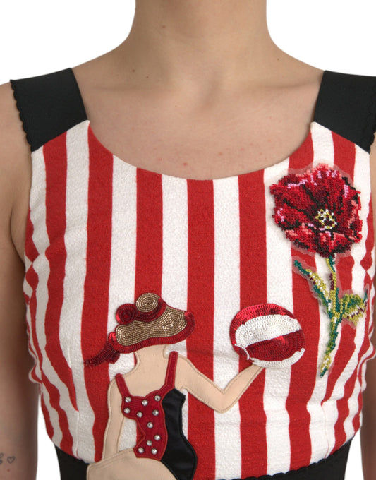 A red and white floral sleeveless midi dress with a fish embroidery
