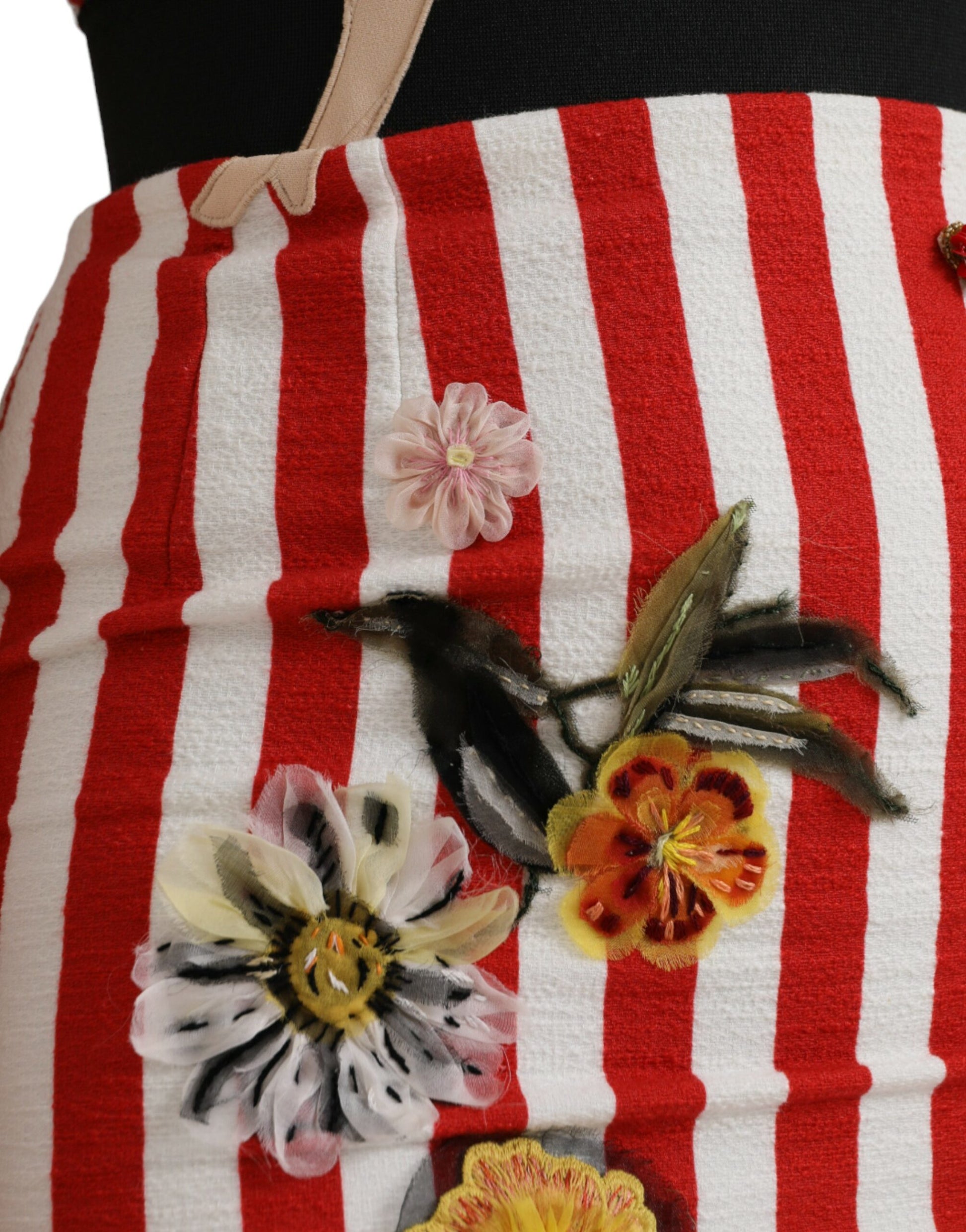 A red and white floral sleeveless midi dress with embroidered flowers