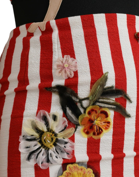 A red and white floral sleeveless midi dress with embroidered flowers
