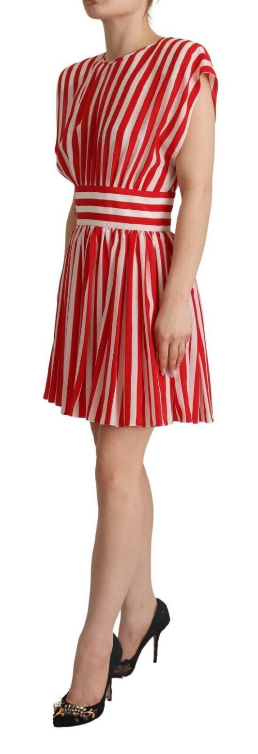 A red and white striped mini dress with an A-line silhouette. It features a belted waist and is made of silk