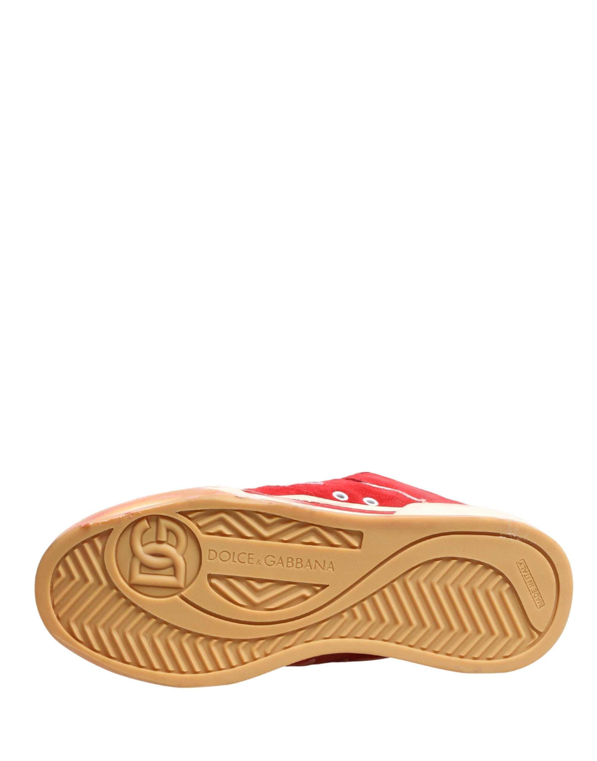 Footwear with a red strap across the top
