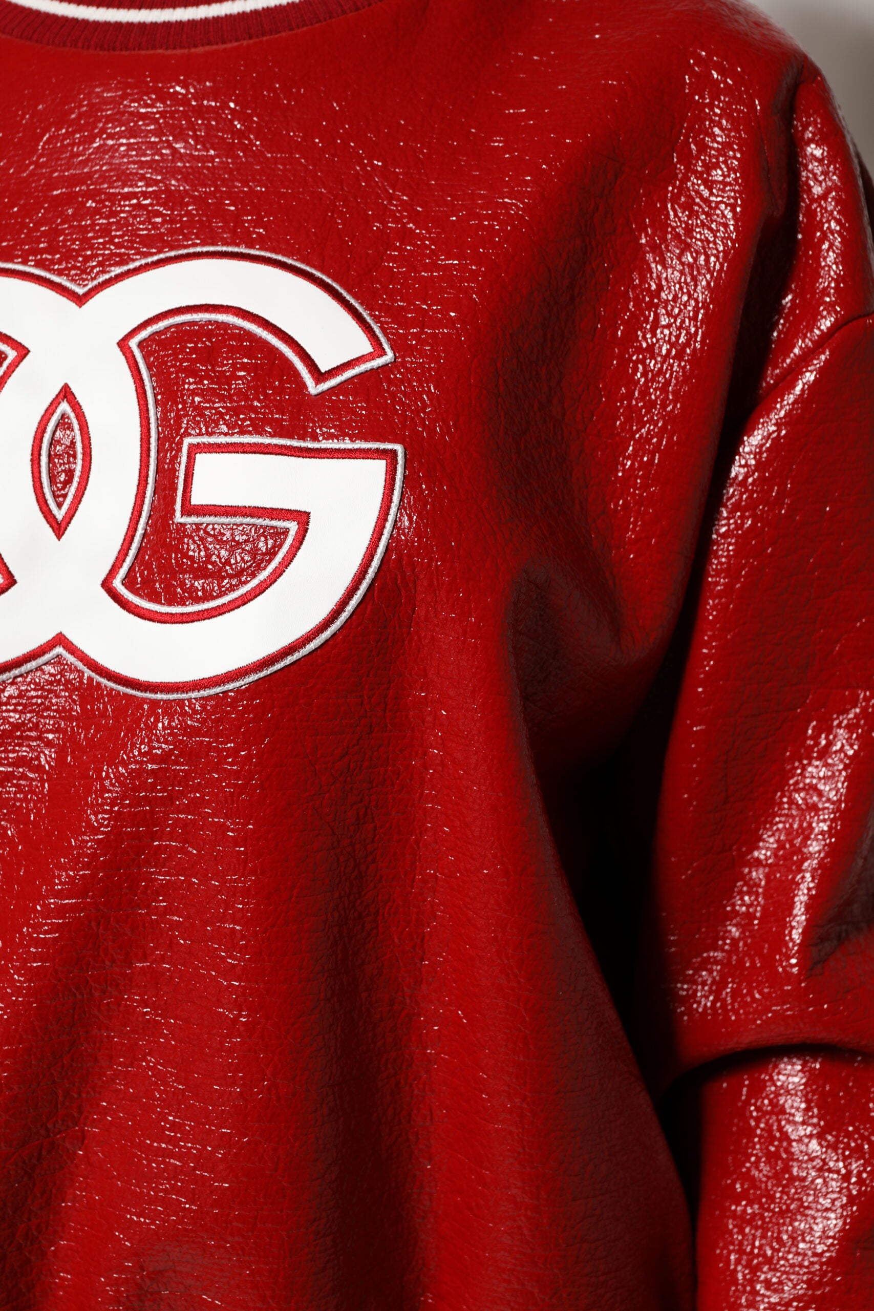 Red sweatshirt with white logo