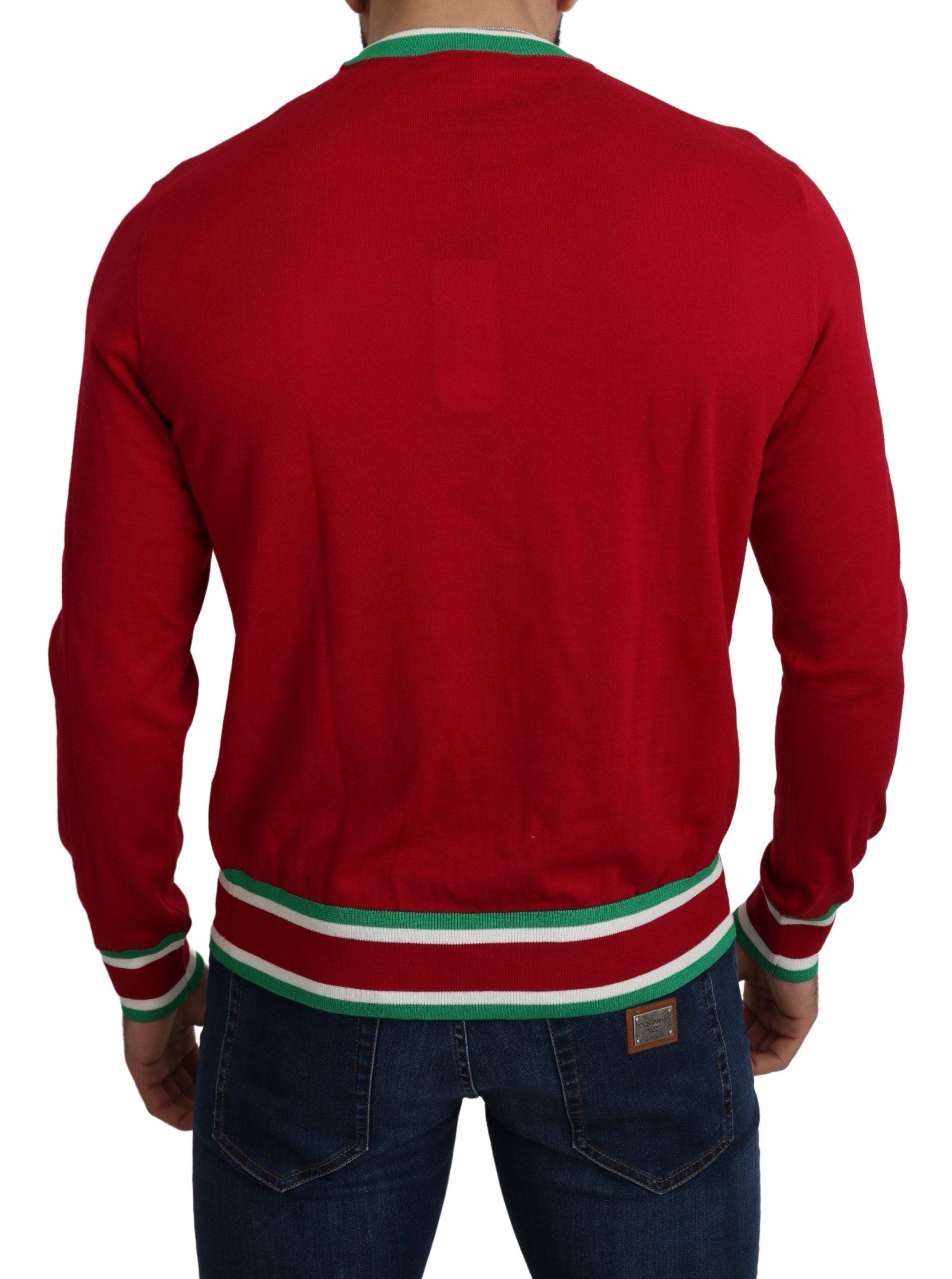 Red sweater with white stripes on sleeves