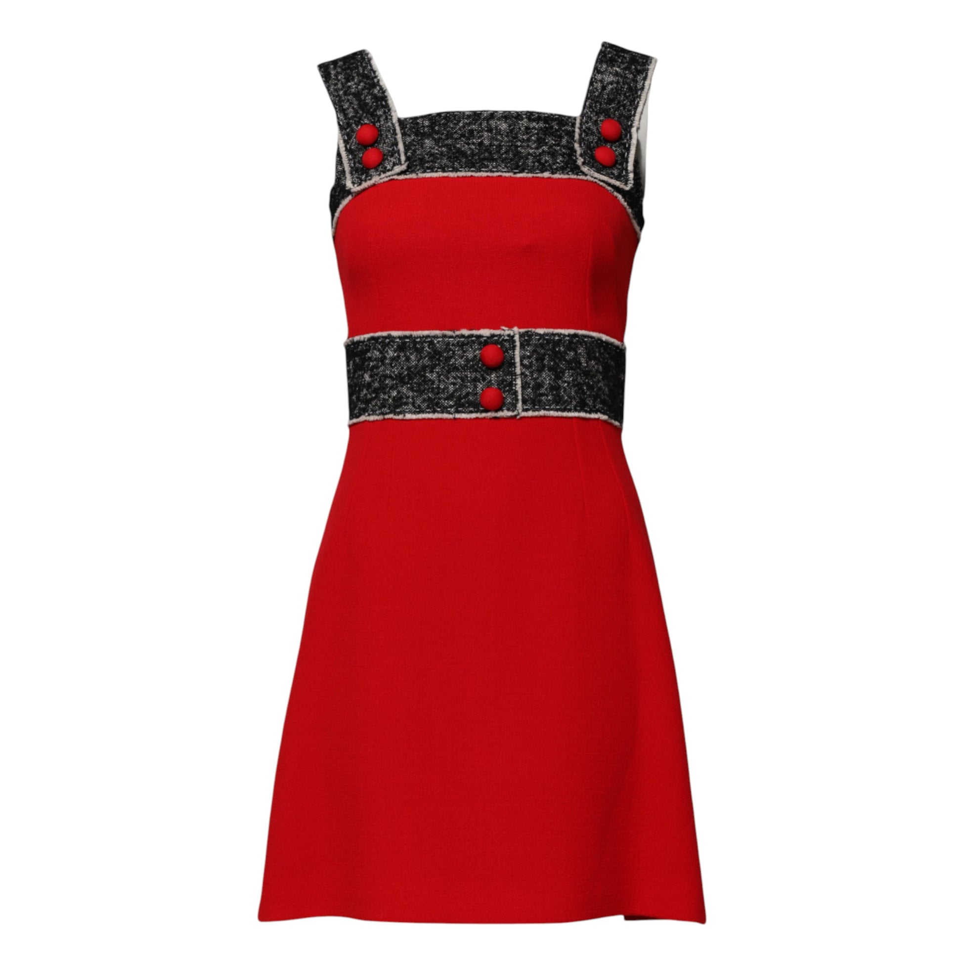 A red wool dress with black and white accents. It features a flared A-line silhouette, short sleeves, and a r