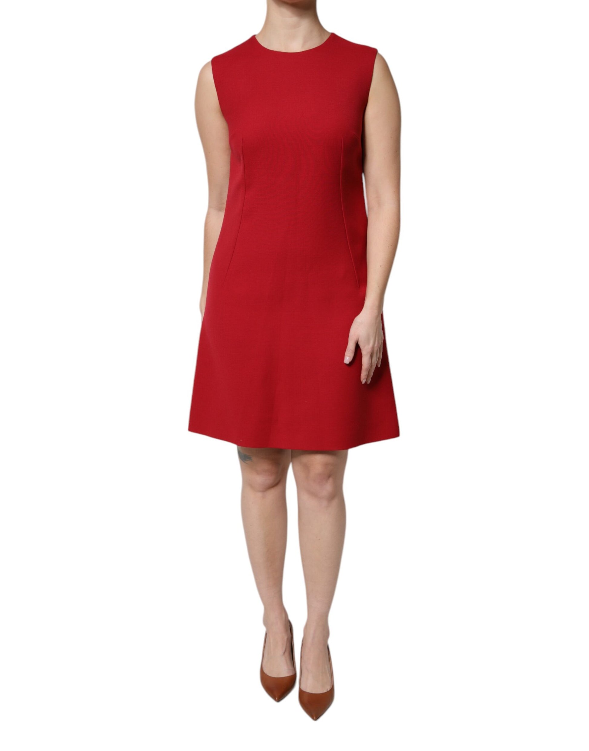 A red sleeveless knee length dress