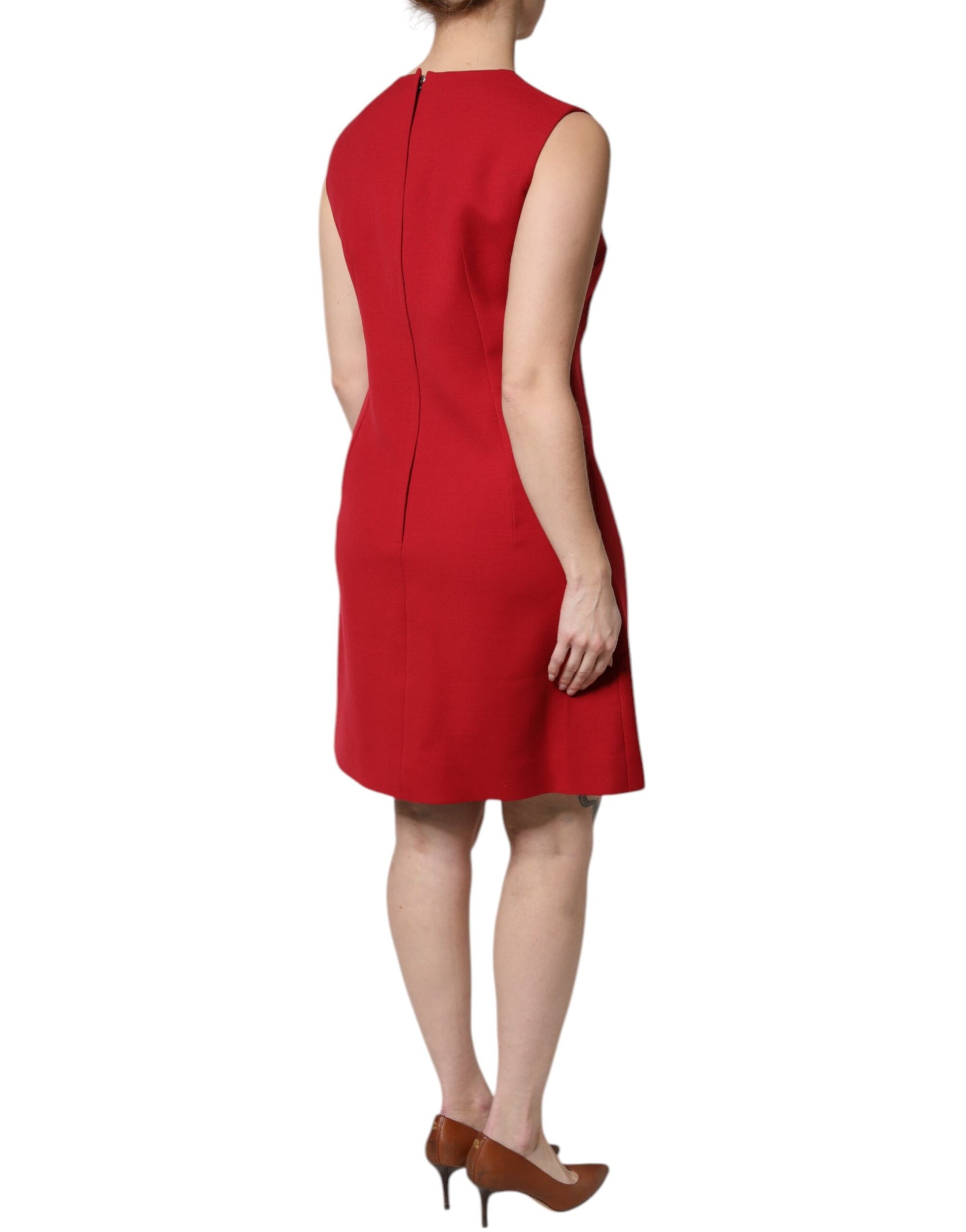 A red sleeveless knee length dress