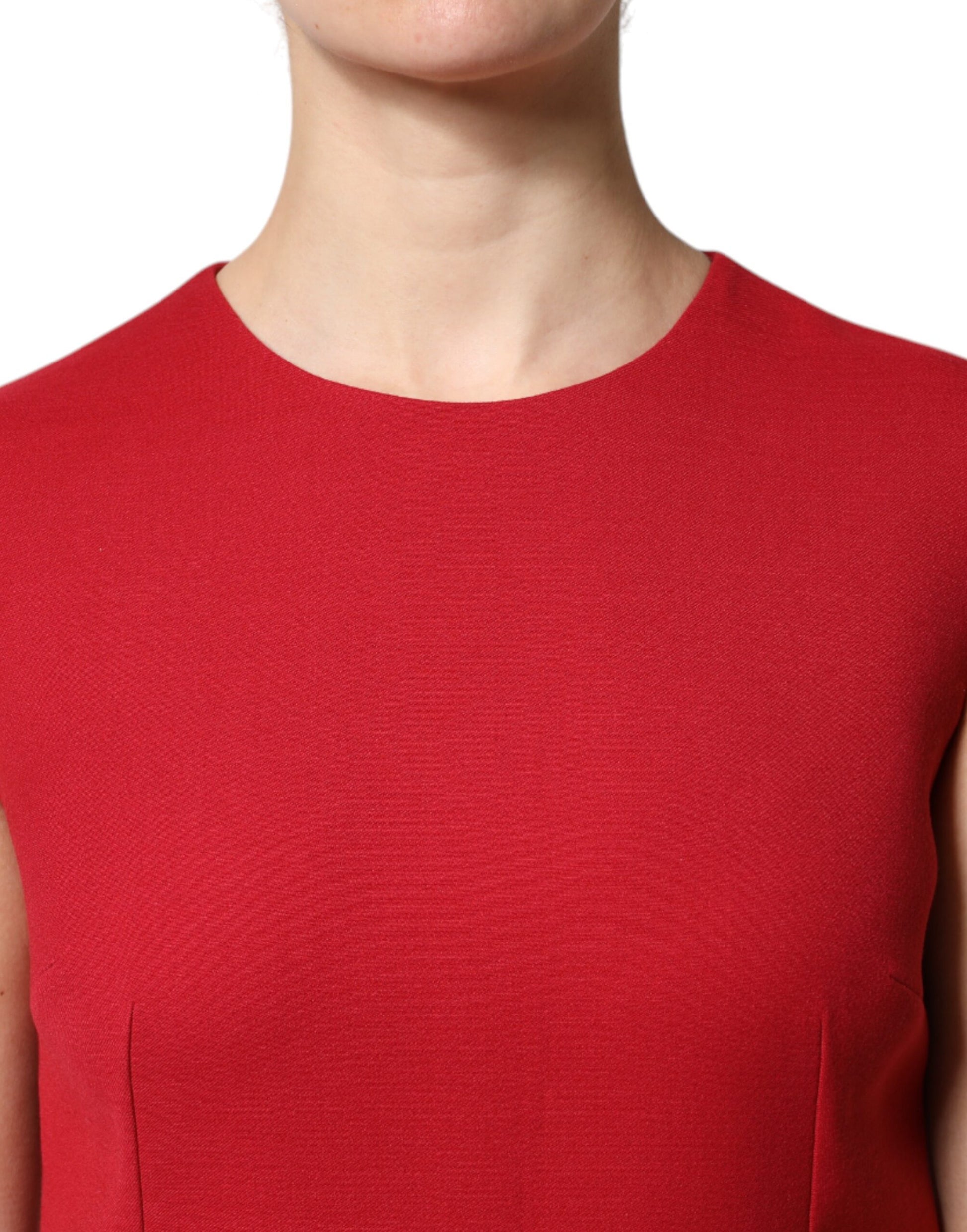 Red wool sleeveless dress with V-neck and A-line silhouette