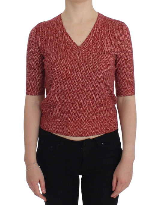 Woman wearing red sweater with V neckline