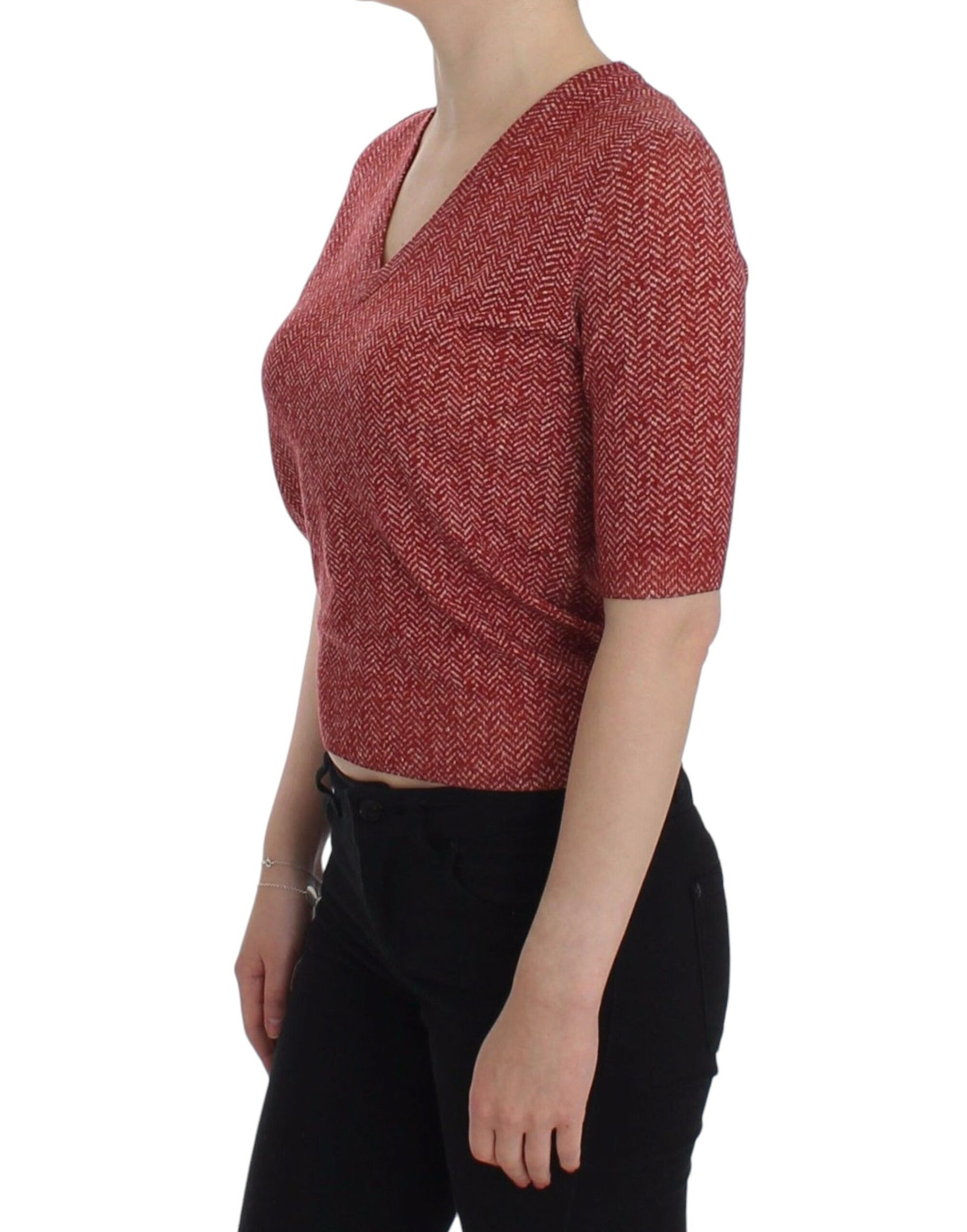 Woman wearing red knit top