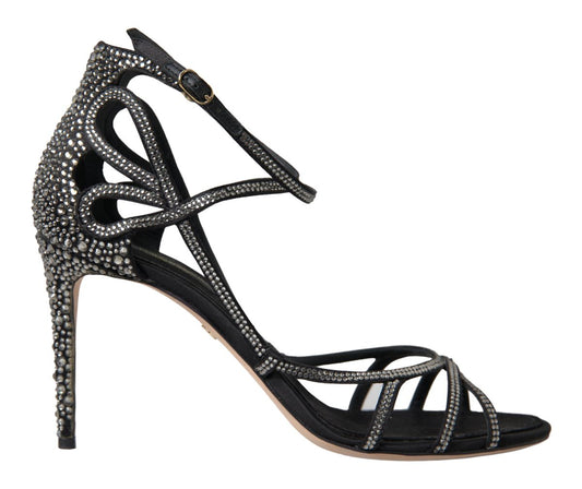 Black high heel shoe with embellishments and straps