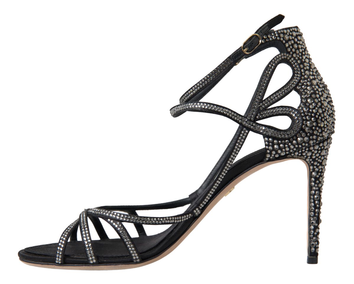 Black high heel shoe with embellishments and ankle strap