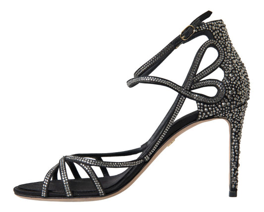 Black high heel shoe with embellishments and ankle strap