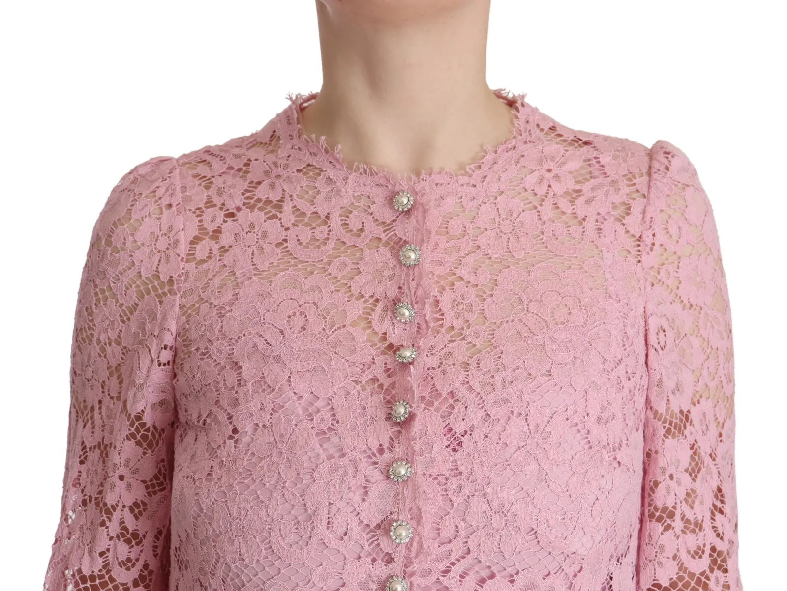 Pink lace dress with feathered sleeves and buttons on shoulders