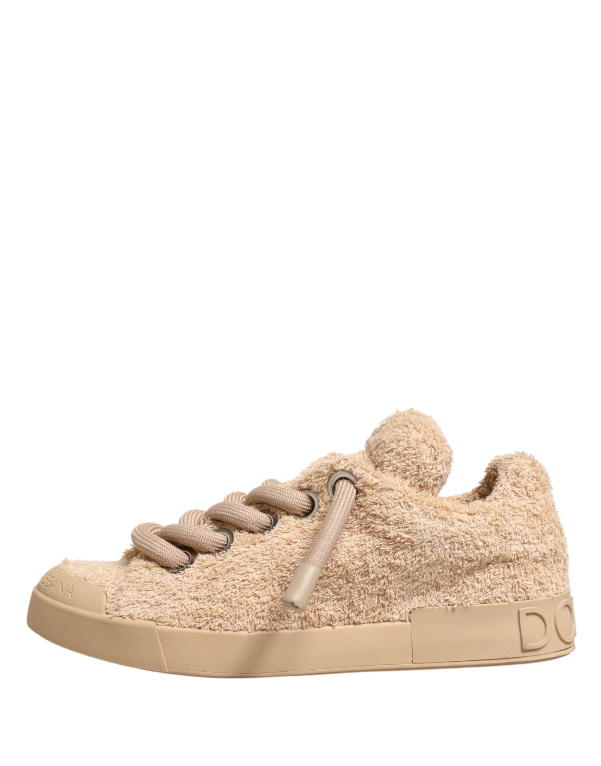 Tan faux shearling sneakers with black laces, low top, and a chunky sole