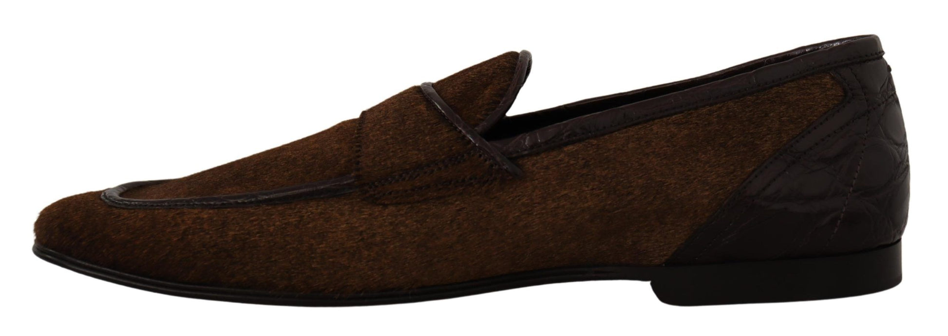 Pair of brown loafers with laces and a strap across the top