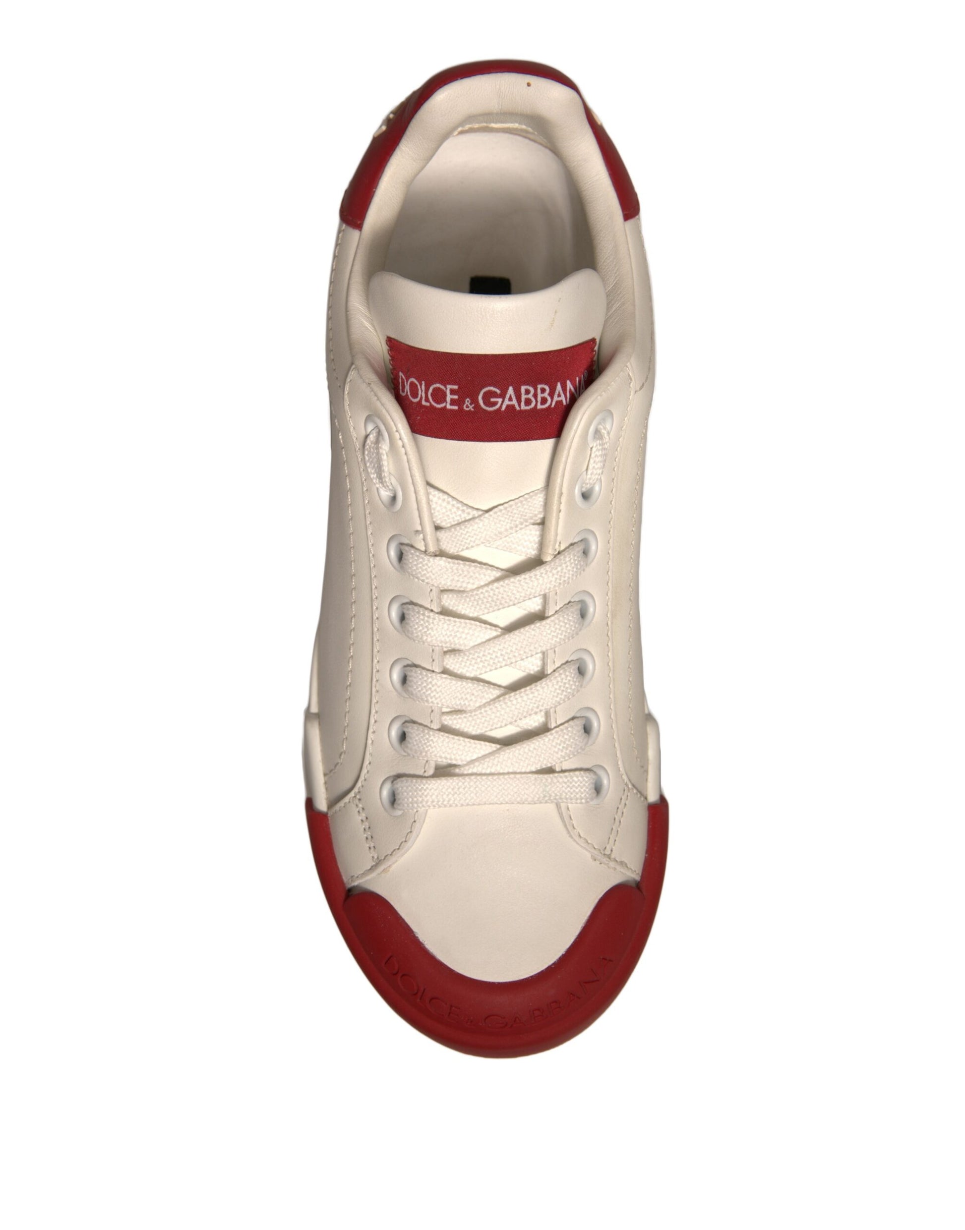 White sneaker with red accents