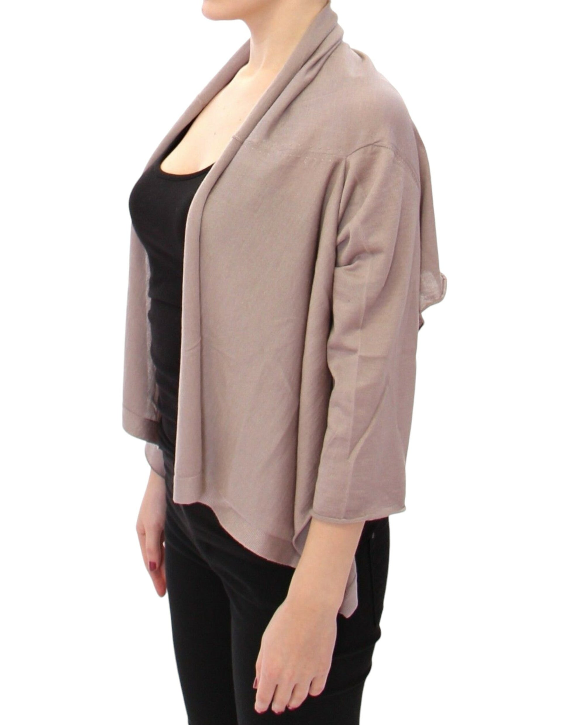 Woman wearing a beige cardigan