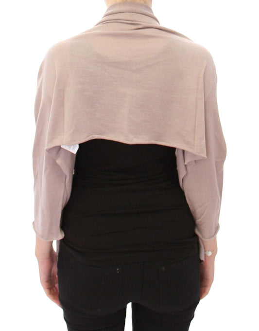 Woman wearing a pink scarf over black top