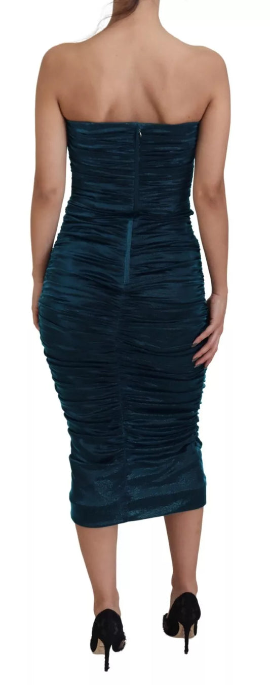A fitted strapless dress in blue satin with a textured pattern, designed by Dolce & Gabbana