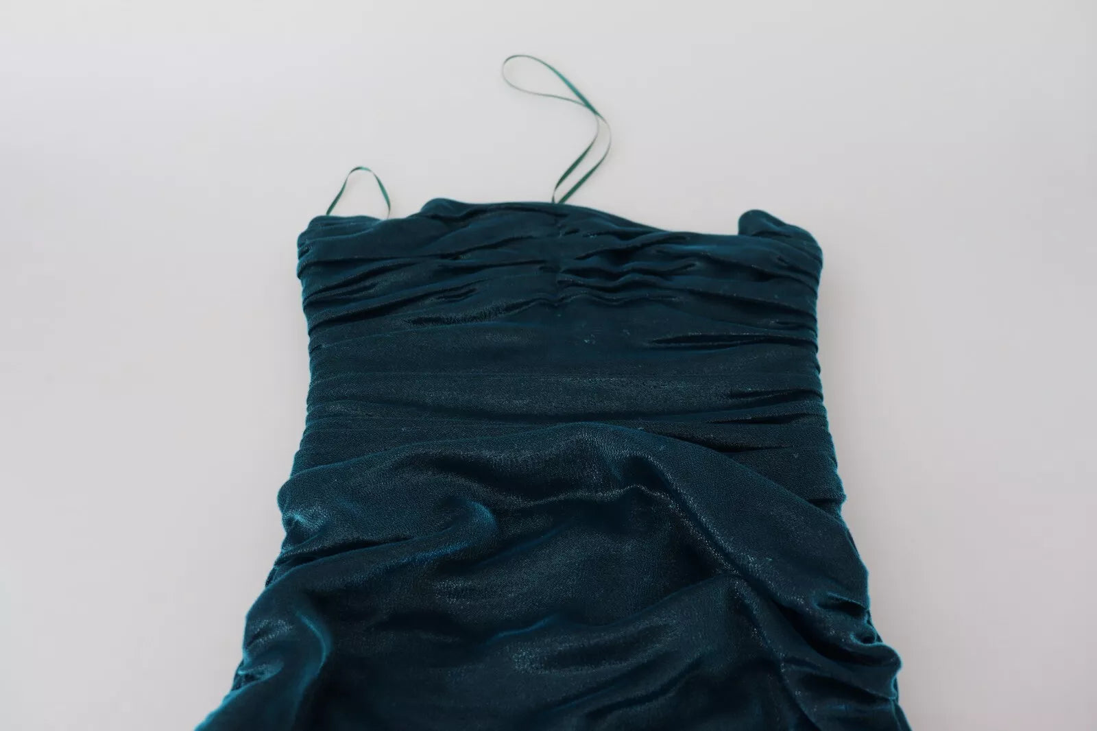 A fitted strapless dress in a blue satin blend fabric