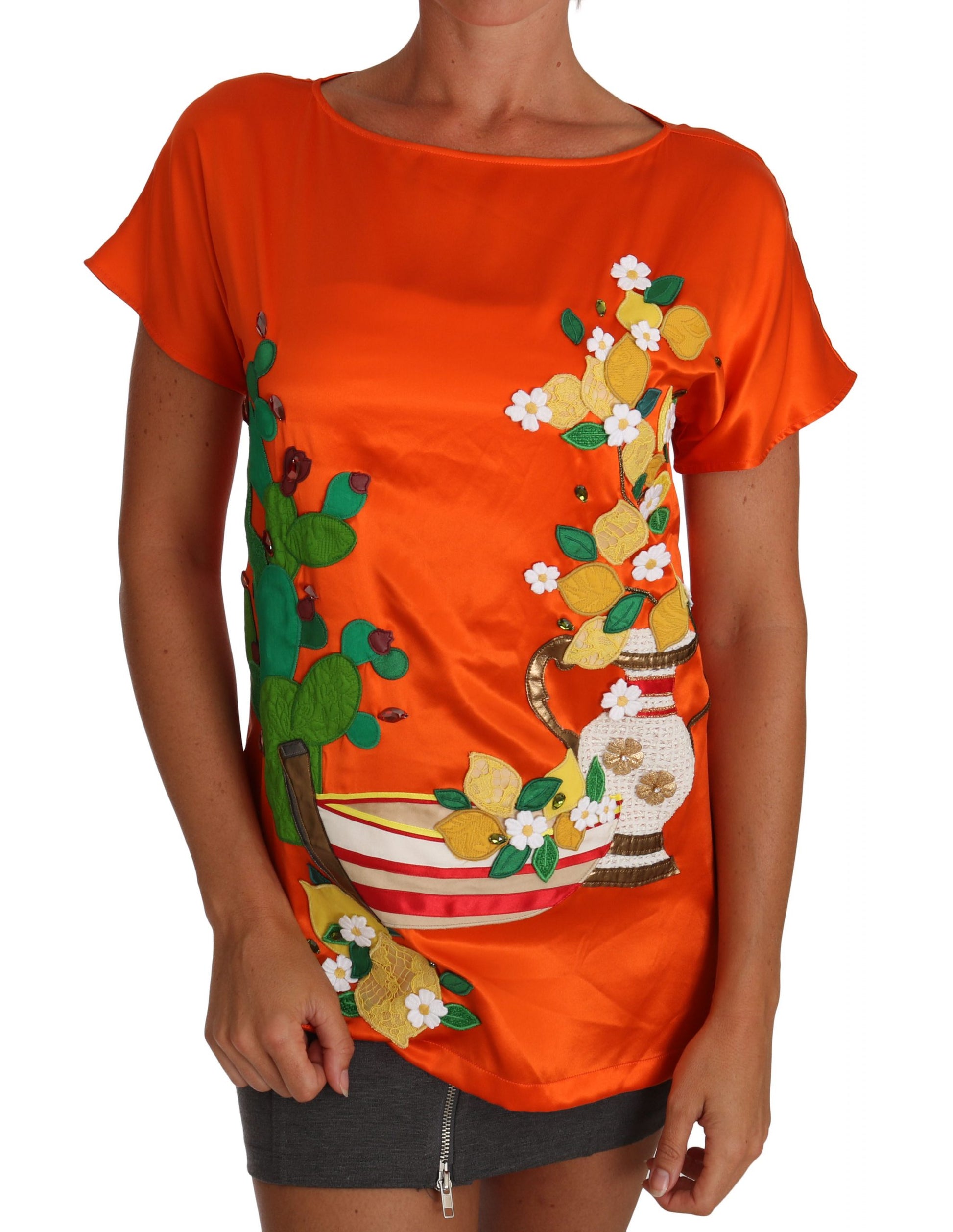 Orange shirt with floral design on front