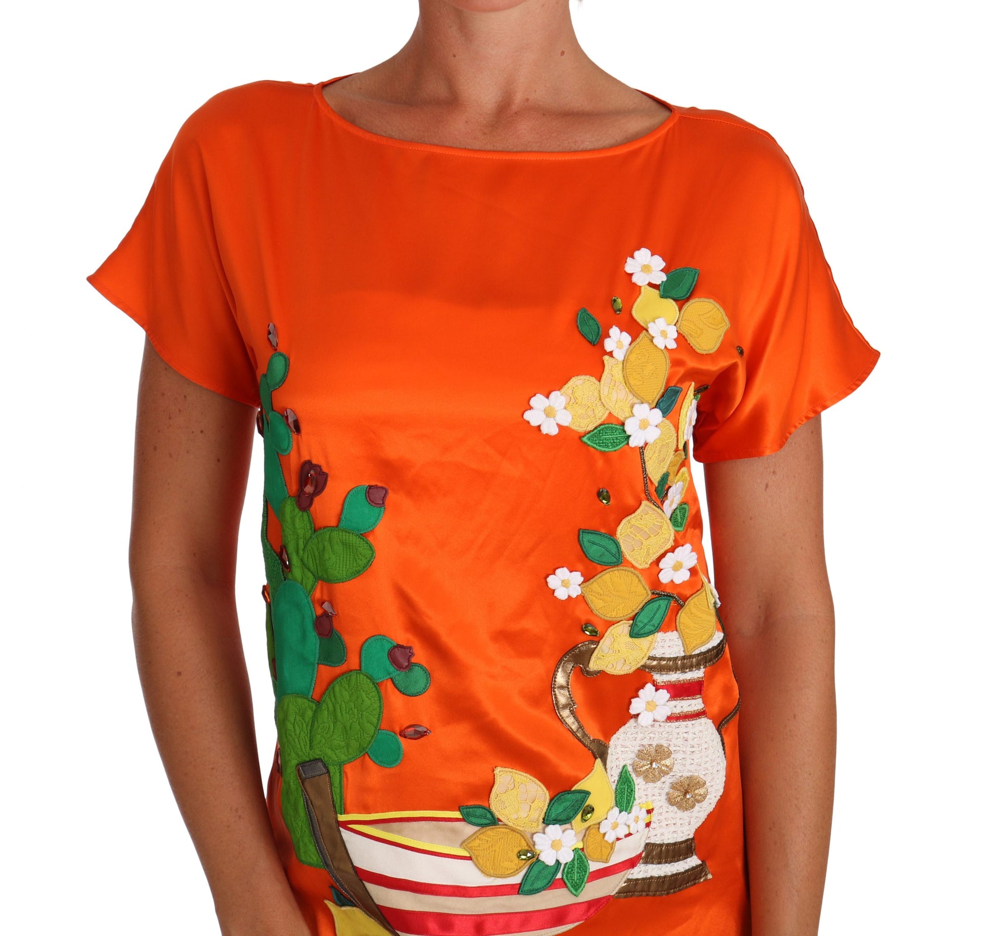 Orange blouse with embroidered cactus and flowers